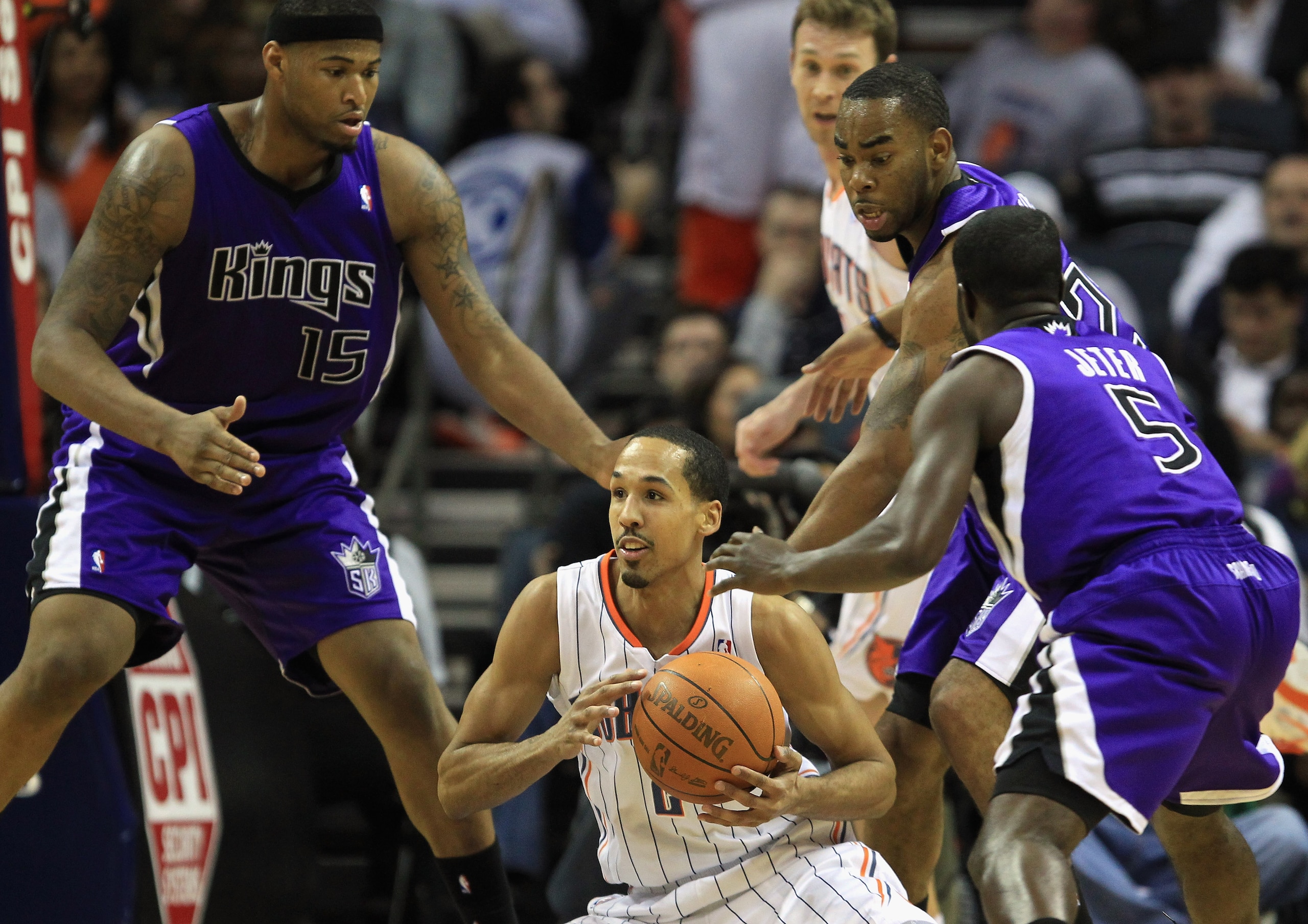CHARLOTTE, NC - FEBRUARY 25: Eugene Jeter #5 of the Sacramento Kings tries to steal the ball from Shaun Livingston #2 of the Charlotte Bobcats during their game at Time Warner Cable Arena on February 25, 2011 in Charlotte, North Carolina. NOTE TO USER: U CHARLOTTE, NC - FEBRUARY 25: Eugene Jeter #5 of the Sacramento Kings tries to steal the ball from Shaun Livingston #2 of the Charlotte Bobcats during their game at Time Warner Cable Arena on February 25, 2011 in Charlotte, North Carolina. NOTE TO USER: U