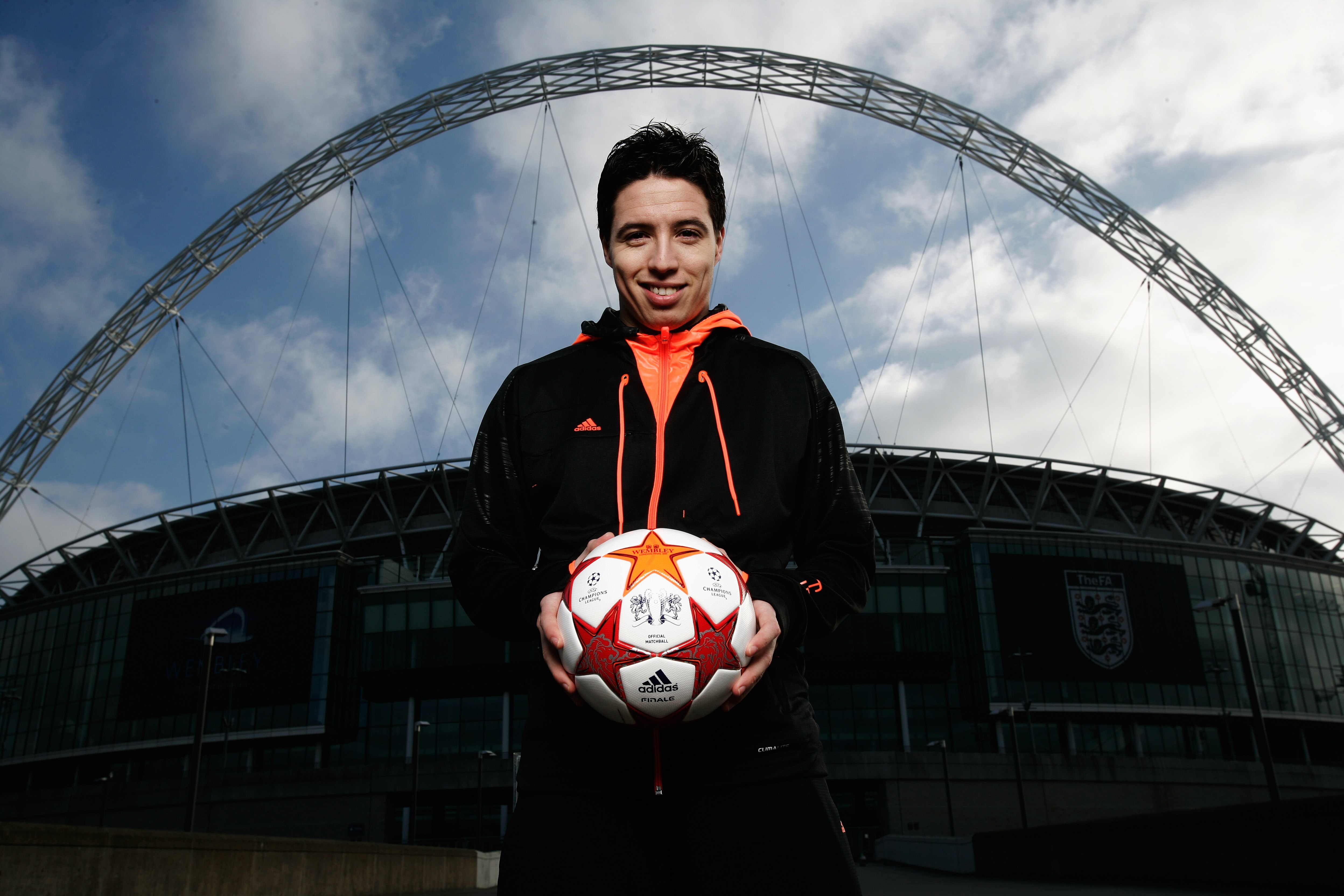 LONDON, ENGLAND - MARCH 03:  Samir Nasri of Arsenal is seen under the Wembley arch as adidas present the Official Match Ball for the 2011 UEFA Champions League Final at Wembley Stadium on March 3, 2011 in London, United Kingdom.  (Photo by Gary Prior/Gett