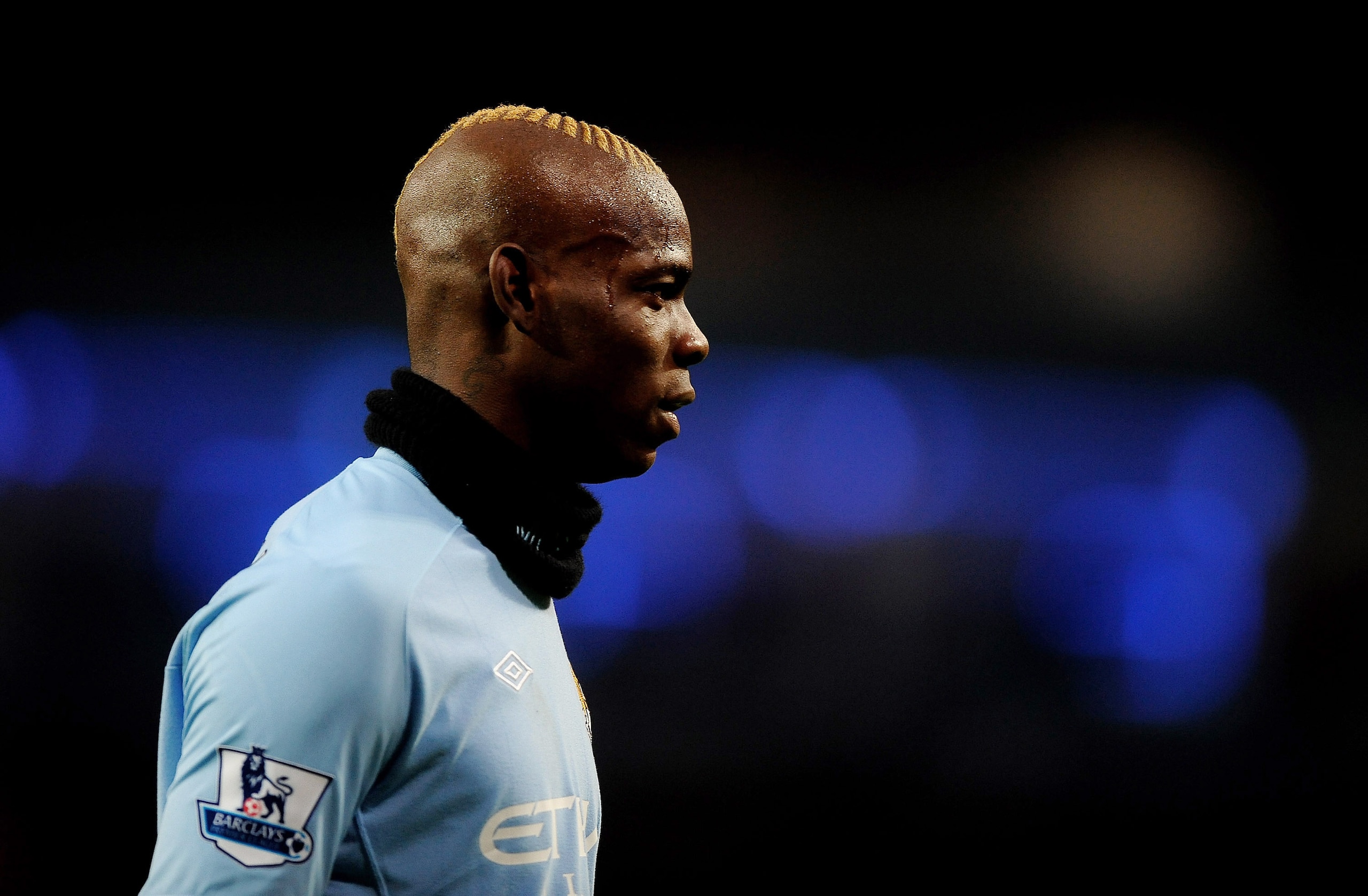 MANCHESTER, UNITED KINGDOM - MARCH 05:  Mario Balotelli of Manchester City looks on during the Barclays Premier League match between Manchester City and Wigan Athletic at the City of Manchester Stadium on March 5, 2011 in Manchester, England. (Photo by La