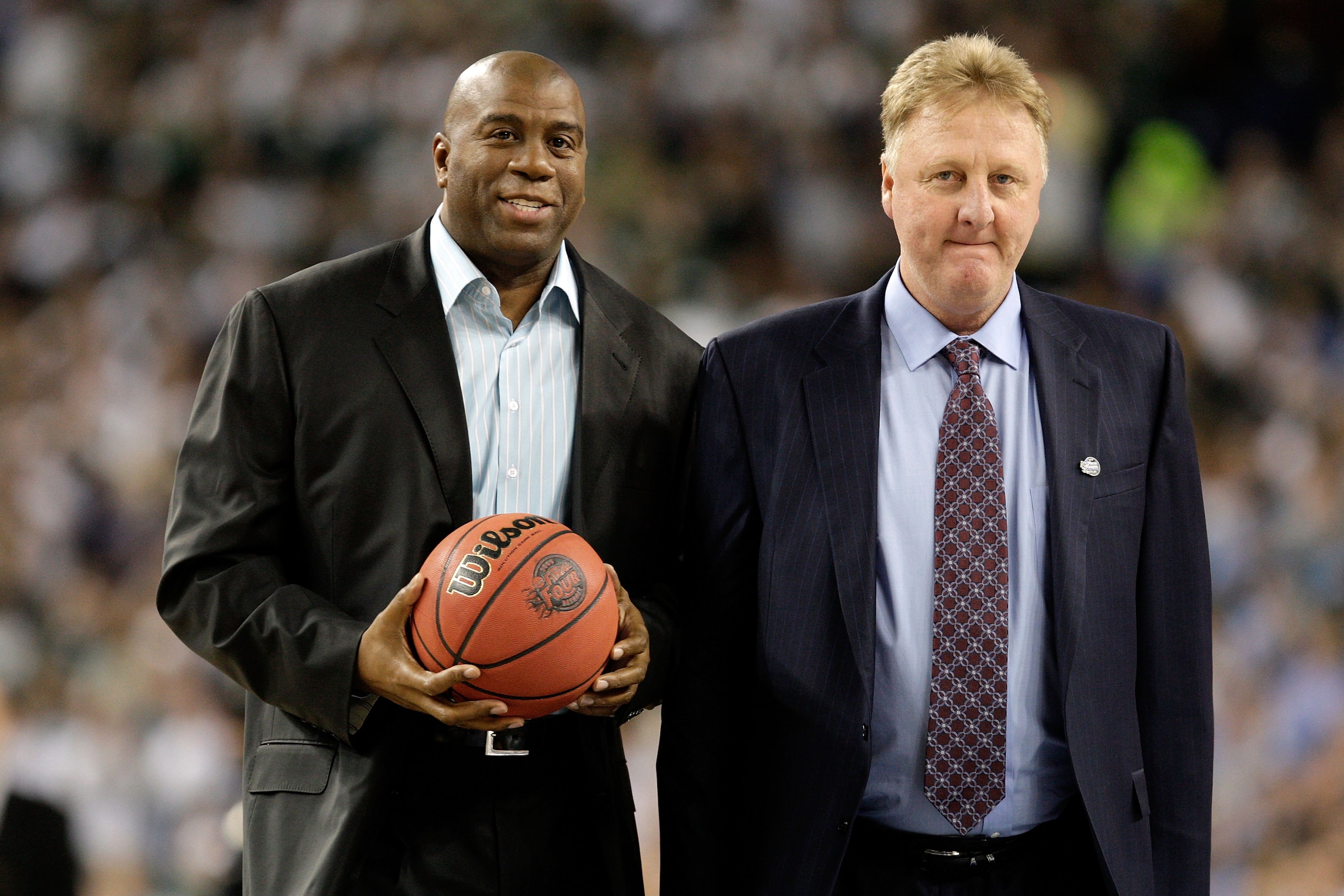 DETROIT - APRIL 06: Larry Bird (R) and Earvin 'Magic' Johnson walk on the court to be honored for the 30th anniversary of their match up in 1979 NCAA Championship Game between Indiana State and Michigan State prior to the Michigan State Spartans playing DETROIT - APRIL 06: Larry Bird (R) and Earvin 'Magic' Johnson walk on the court to be honored for the 30th anniversary of their match up in 1979 NCAA Championship Game between Indiana State and Michigan State prior to the Michigan State Spartans playing
