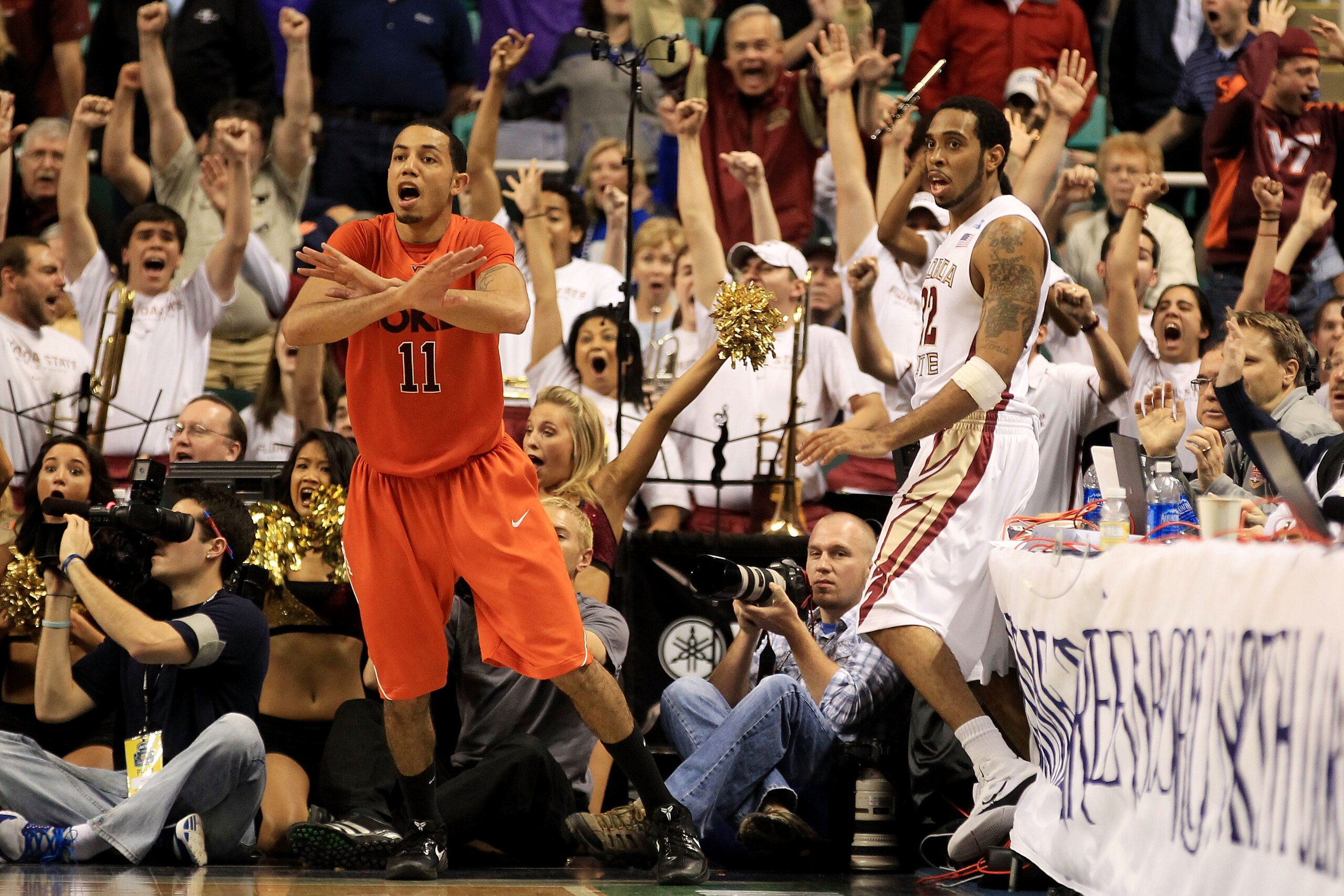 GREENSBORO, NC - MARCH 11:  Erick Green #11 of the Virginia Tech Hokies reacts to a shot at the buzzer by Derwin Kitchen #22 of the Florida State Seminoles that would have won the game during the quarterfinals of the 2011 ACC men's basketball tournament a