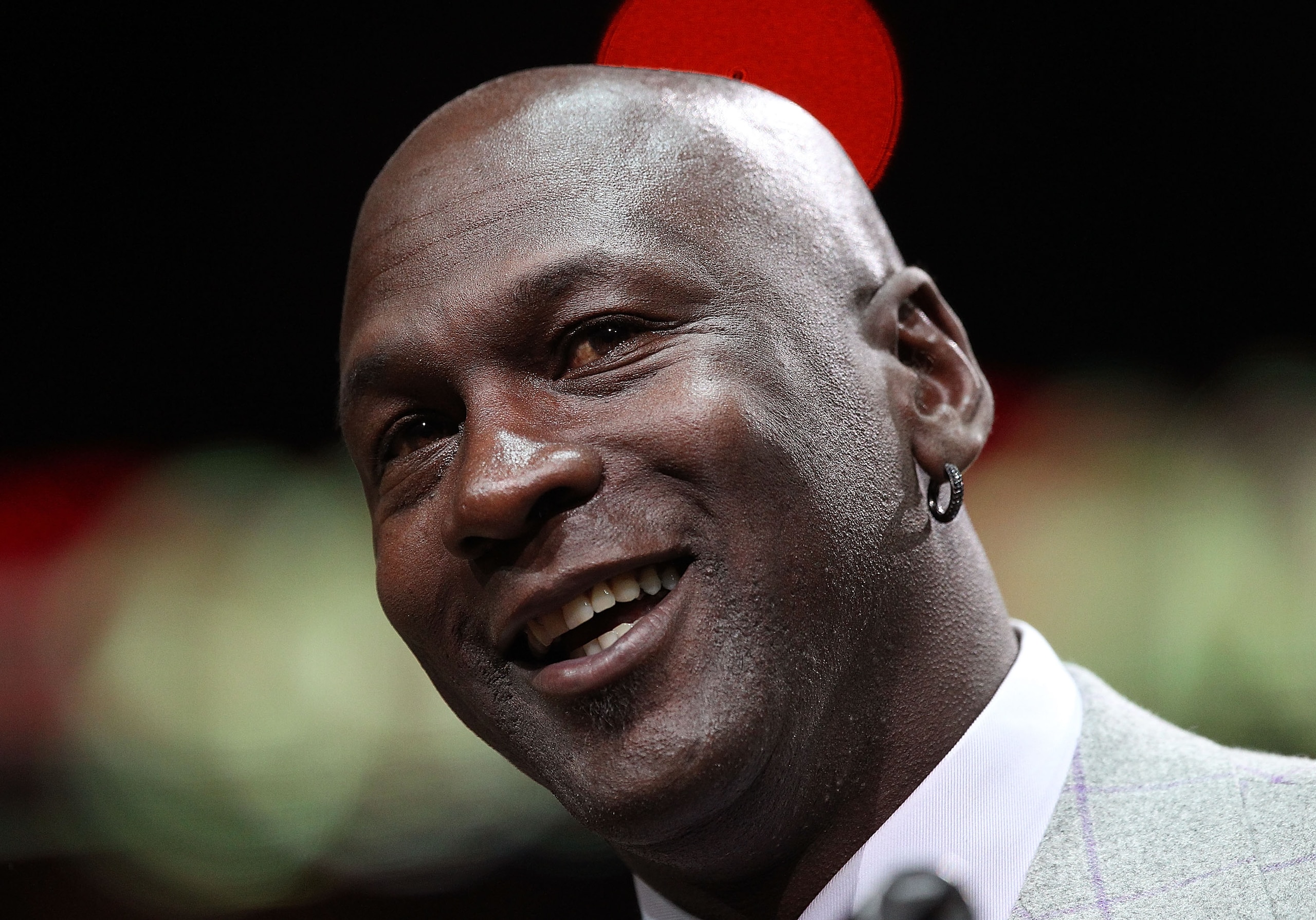 CHICAGO, IL - MARCH 12: Former player Michael Jordan of the Chicago Bulls addresses the crowd during a 20th anniversary recognition ceremony of the Bulls 1st NBA Championship in 1991 during half-time of a game bewteen the Bulls and the Utah Jazz at the Un CHICAGO, IL - MARCH 12: Former player Michael Jordan of the Chicago Bulls addresses the crowd during a 20th anniversary recognition ceremony of the Bulls 1st NBA Championship in 1991 during half-time of a game bewteen the Bulls and the Utah Jazz at the Un