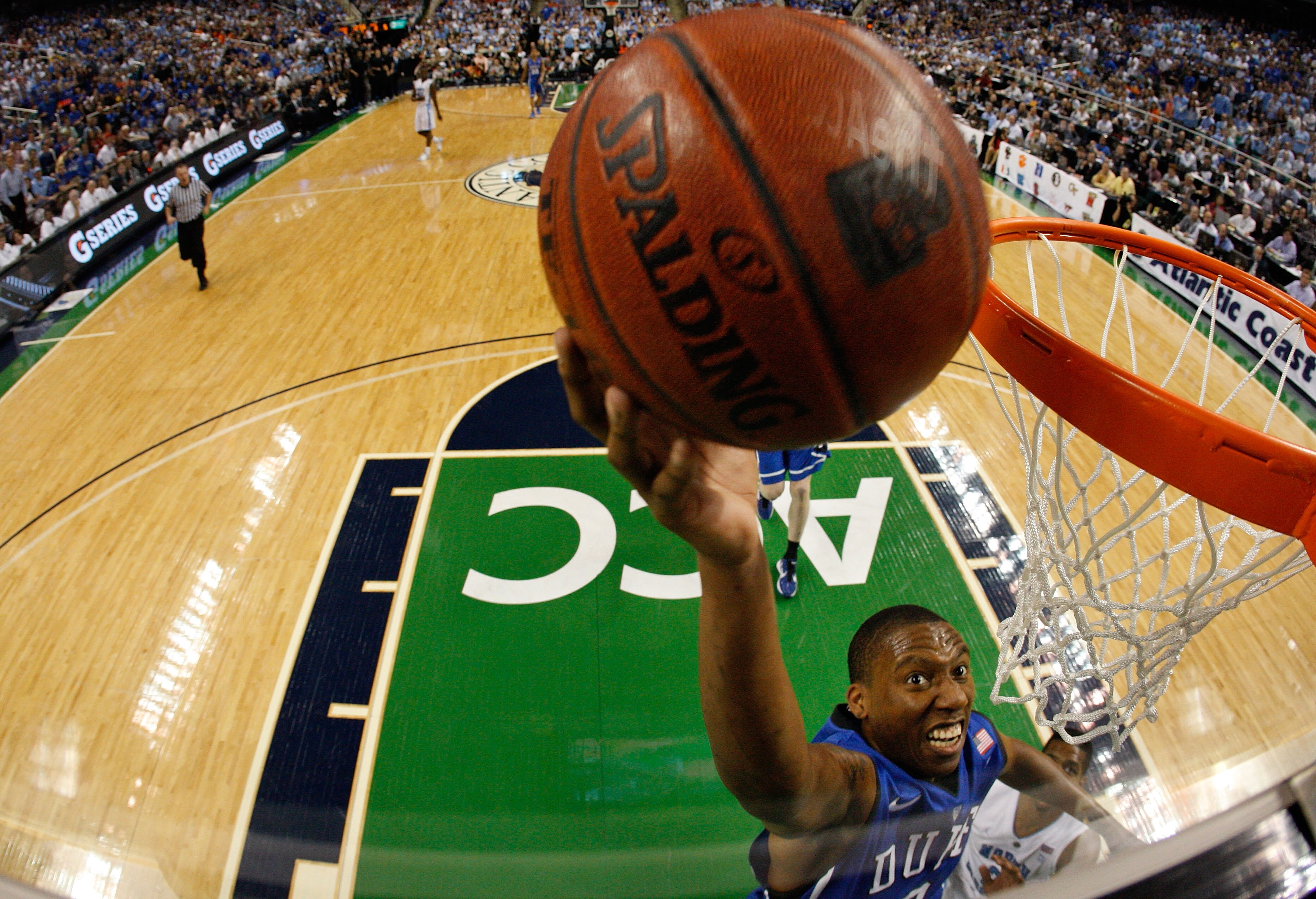 GREENSBORO, NC - MARCH 13: Nolan Smith #2 of the Duke Blue Devils shoots against the North Carolina Tar Heels in the championship game of the 2011 ACC men's basketball tournament at the Greensboro Coliseum on March 13, 2011 in Greensboro, North Carolina. GREENSBORO, NC - MARCH 13: Nolan Smith #2 of the Duke Blue Devils shoots against the North Carolina Tar Heels in the championship game of the 2011 ACC men's basketball tournament at the Greensboro Coliseum on March 13, 2011 in Greensboro, North Carolina.