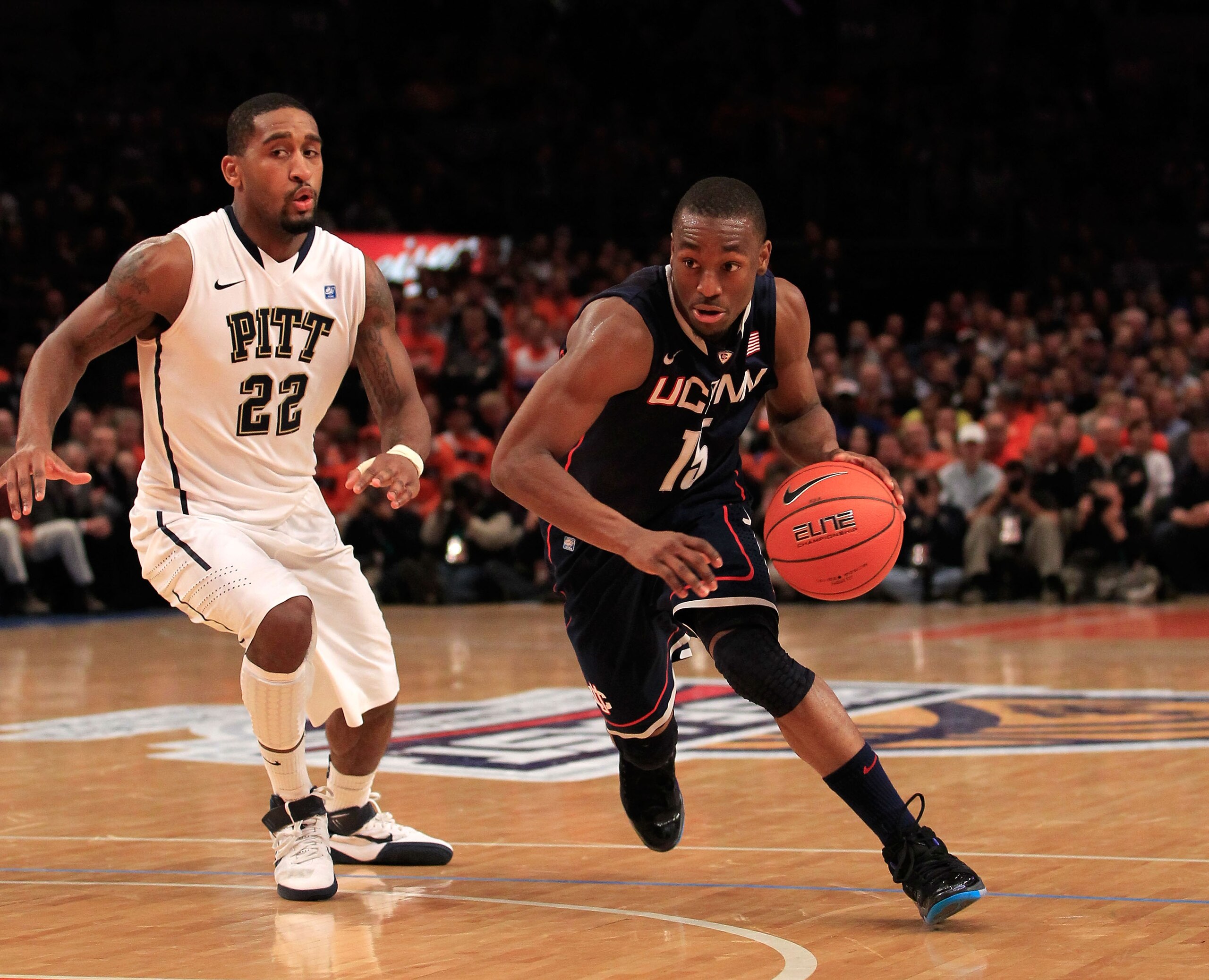 NEW YORK, NY - MARCH 10: Kemba Walker #15 of the Connecticut Huskies drives toward the hoop against Brad Wanamaker #22 of the Pittsburgh Panthers during the quarterfinals of the 2011 Big East Men's Basketball Tournament presented by American Eagle Outfitt