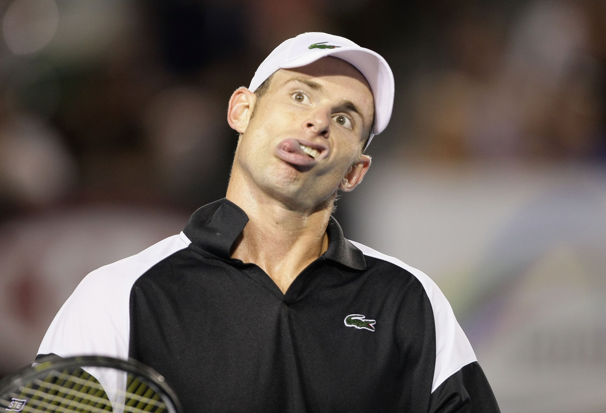 MELBOURNE, AUSTRALIA - JANUARY 29:  Andy Roddick of the United States of America pulls a face to the umpire in his semifinal match against Roger Federer of Switzerland during day eleven of the 2009 Australian Open at Melbourne Park on January 29, 2009 in