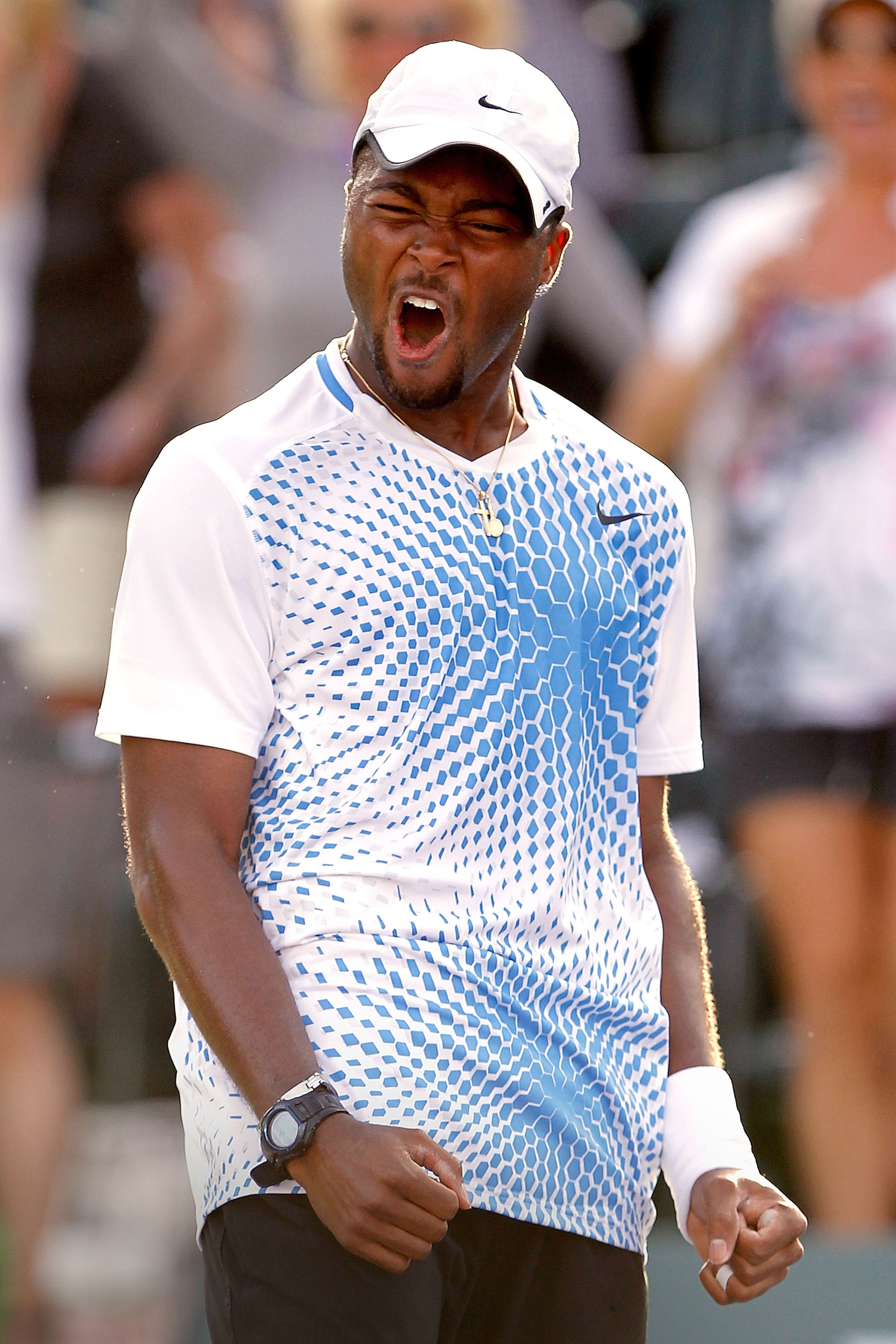 INDIAN WELLS, CA - MARCH 12:  Donald Young celebrates match point against Andy Murray of Great Britain Donald Young during the BNP Paribas Open at the Indian Wells Tennis Garden on March 12, 2011 in Indian Wells, California.  (Photo by Matthew Stockman/Ge