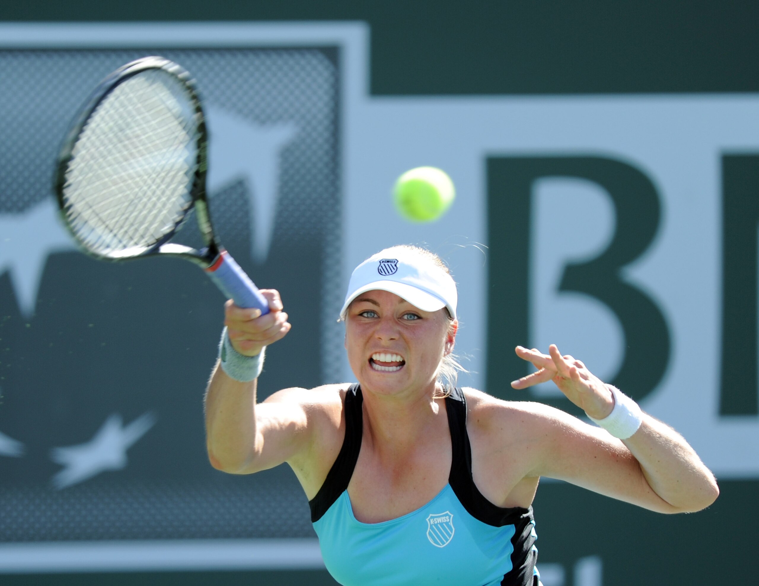 INDIAN WELLS, CA - MARCH 11:  Vera Zvonareva of Russia hits a forehand in her match against Timea Bacsinszky of Switzerland during the BNP Paribas Open at the Indian Wells Tennis Garden on March 11, 2011 in Indian Wells, California.  (Photo by Harry How/G