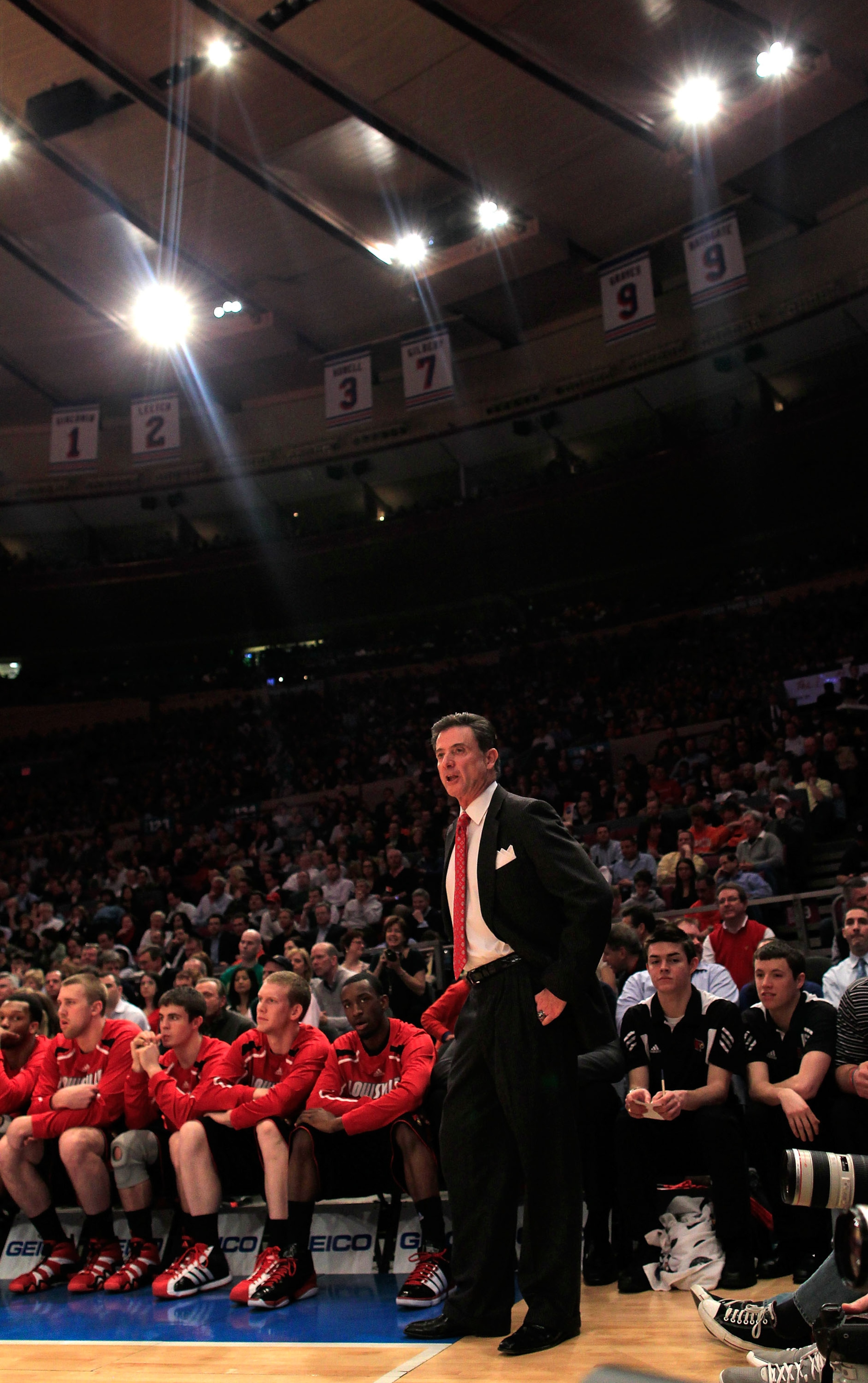 NEW YORK, NY - MARCH 11:  head coach Rick Pitino of the Louisville Cardinals looks on from the bench during the game against the Notre Dame Fighting Irish during the semifinals of the 2011 Big East Men's Basketball Tournament presented by American Eagle O