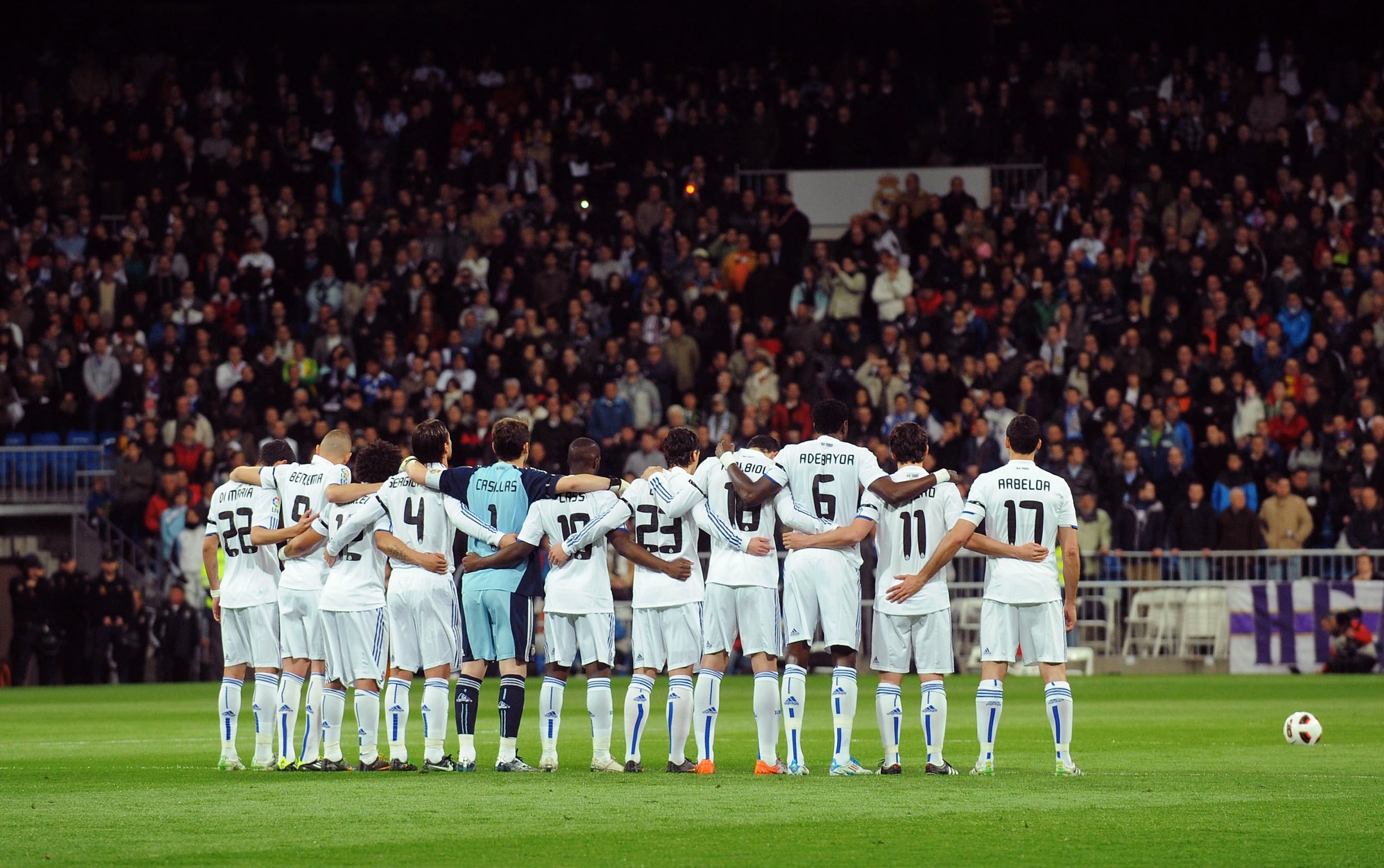 MADRID, SPAIN - MARCH 12:  Real Madrid and Hercules CF players hold a minute of silence in respect for the victims of the recent earthquake in Japan before the La Liga match between Real Madrid and Hercules CF at Estadio Santiago Bernabeu on March 12, 201