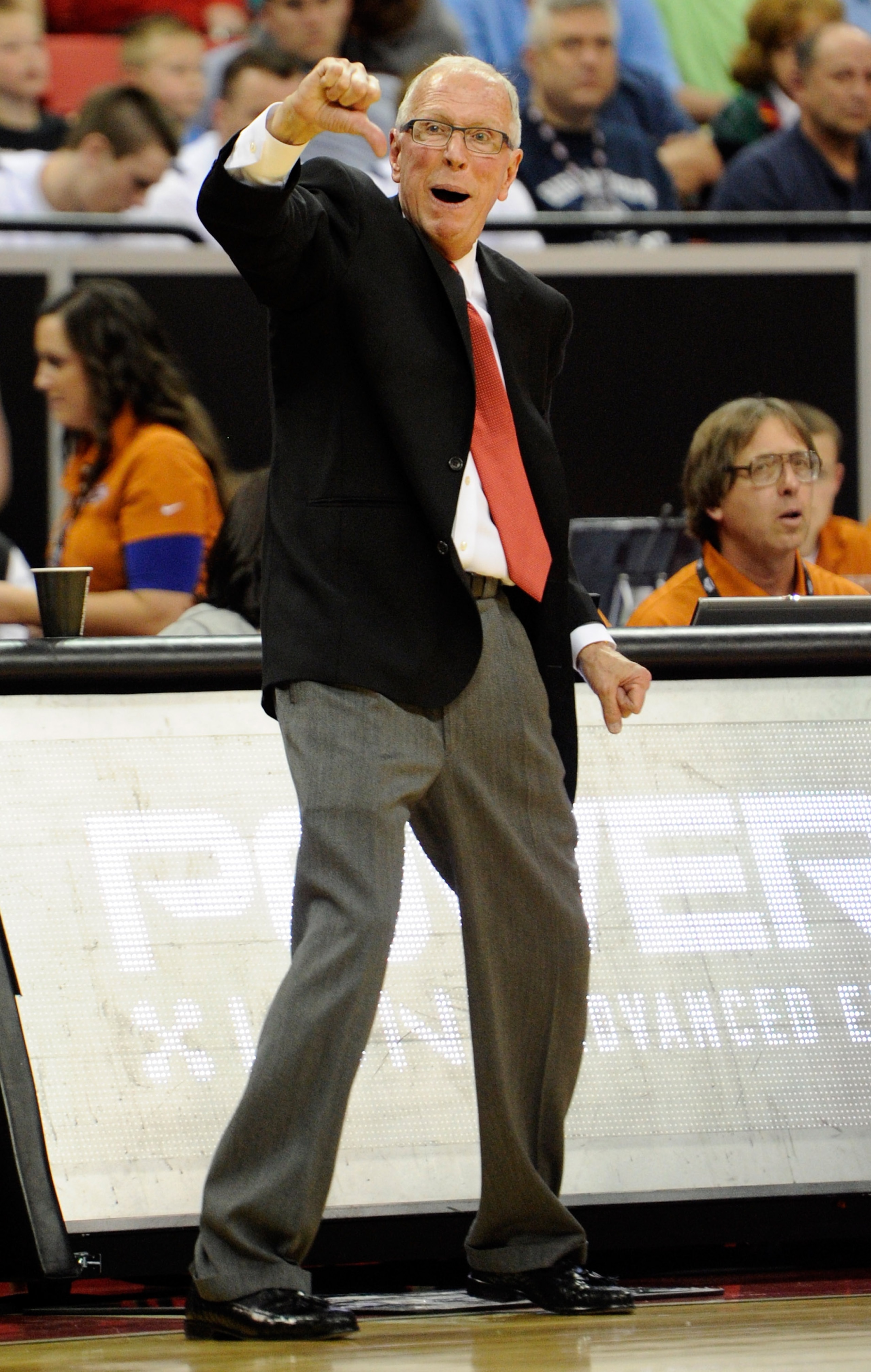 LAS VEGAS, NV - MARCH 12:  Head coach Steve Fisher of the San Diego State Aztecs gestures to his players as they take on the Brigham Young University Cougars during the championship game of the Conoco Mountain West Conference Basketball tournament at the