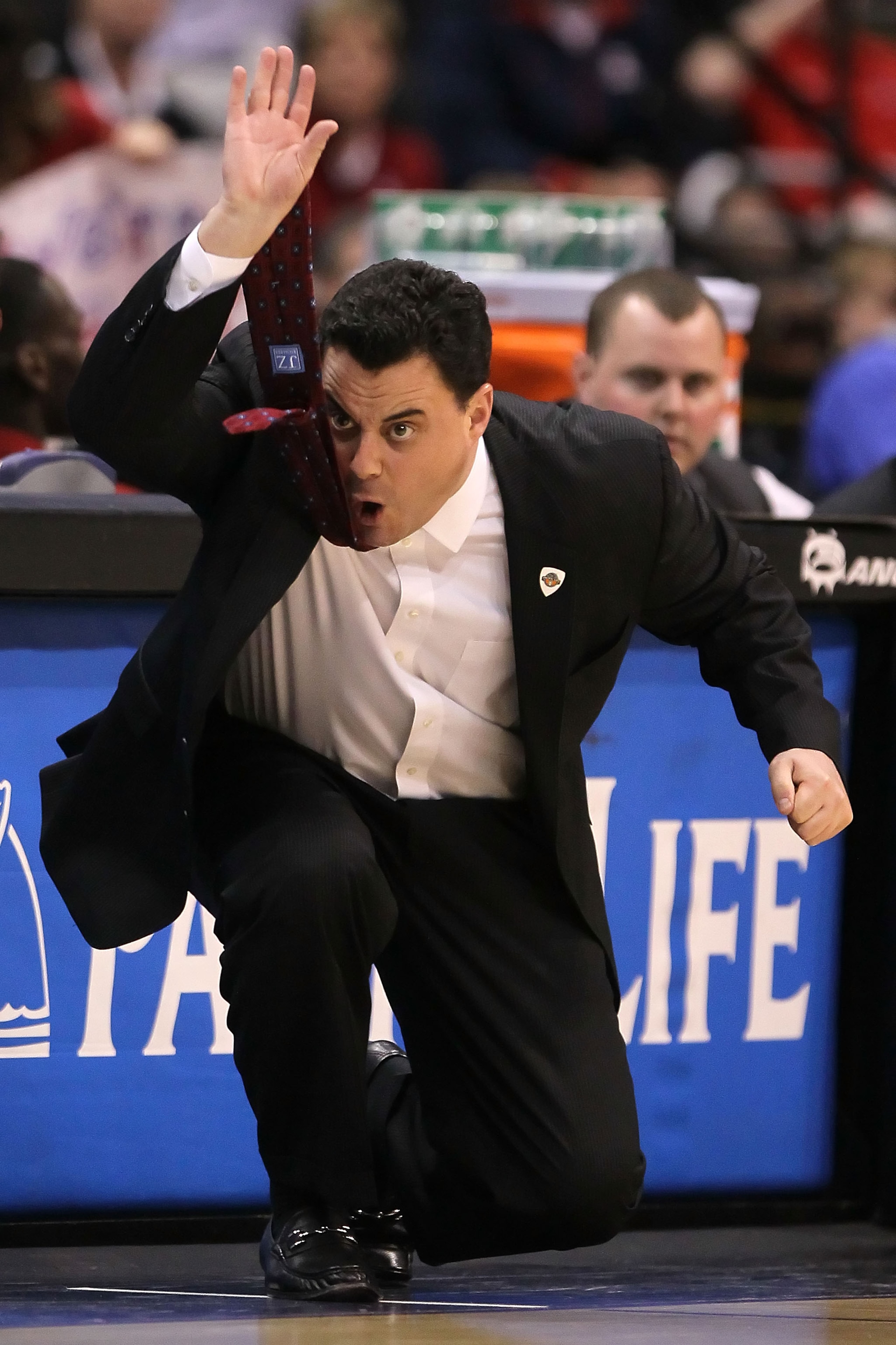 LOS ANGELES, CA - MARCH 12:  Head coach Sean Miller of the Arizona Wildcats reacts in the first half while taking on the Washington Huskies in the championship game of the 2011 Pacific Life Pac-10 Men's Basketball Tournament at Staples Center on March 12,