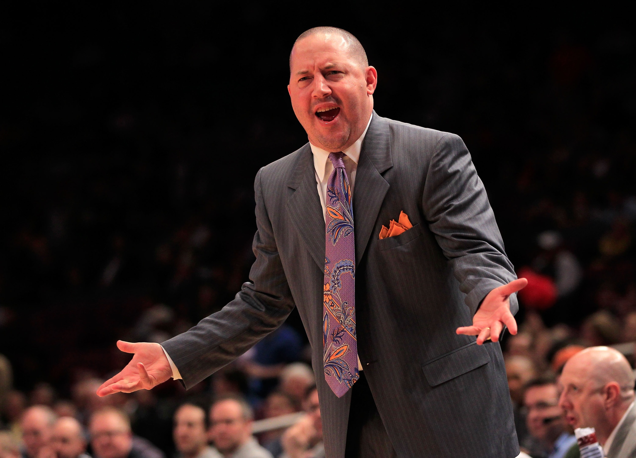 NEW YORK, NY - MARCH 10: head coach Buzz Williams of the Marquette Golden Eagles gestures from the bench during the game against the Louisville Cardinals during the quarterfinals of the 2011 Big East Men's Basketball Tournament presented by American Eagle
