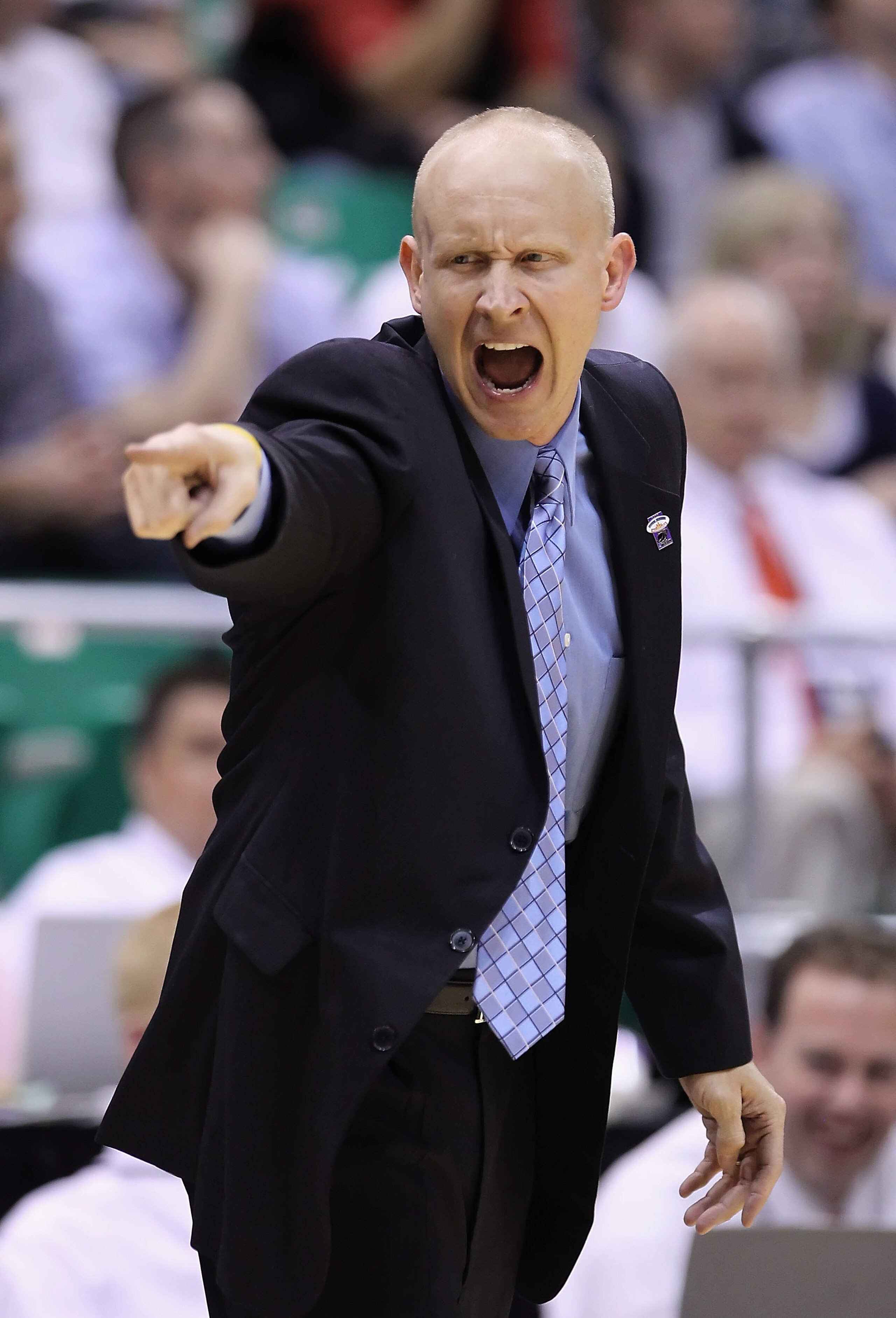 SALT LAKE CITY - MARCH 25:  Head coach Chris Mack of the Xavier Musketeers reacts to a call during the west regional semifinal of the 2010 NCAA men's basketball tournament against the Kansas State Wildcats at the Energy Solutions Arena on March 25, 2010 i
