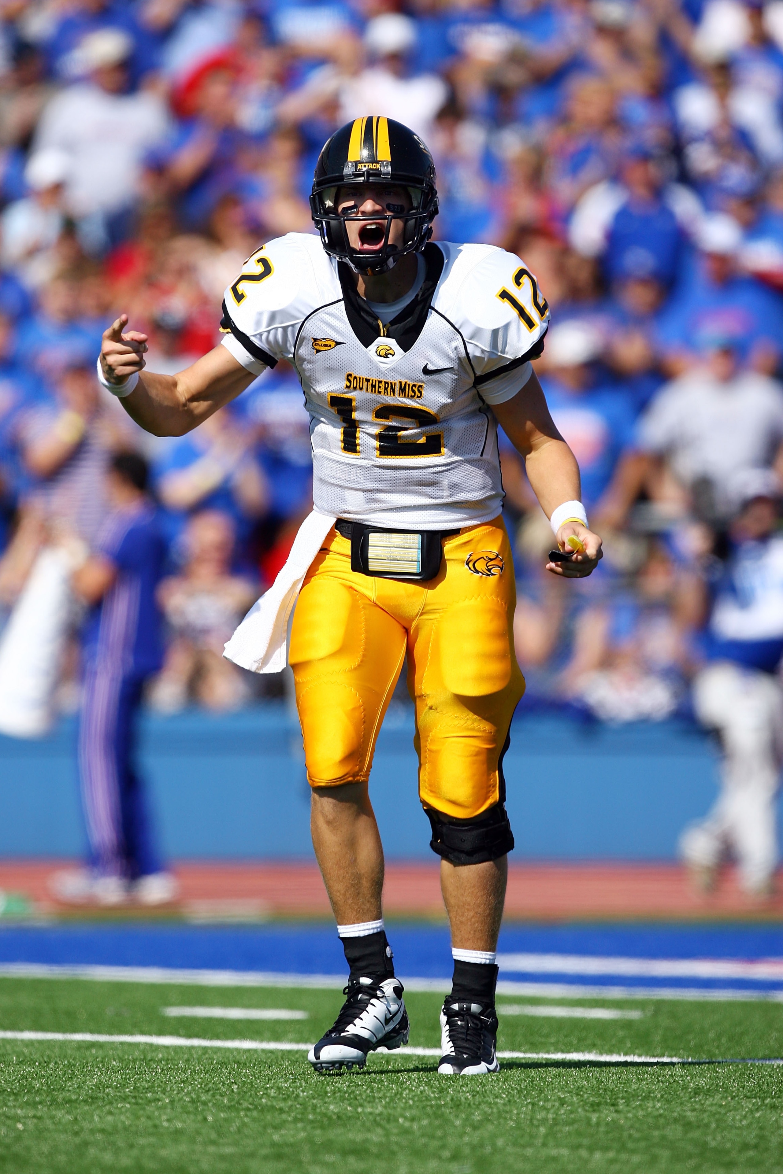 LAWRENCE, KS - SEPTEMBER 26:  Quarterback Austin Davis #12 of the Southern Mississippi Golden Eagles reacts during the game against the Kansas Jayhawks on September 26, 2009 at Memorial Stadium in Lawrence, Kansas.  (Photo by Jamie Squire/Getty Images)