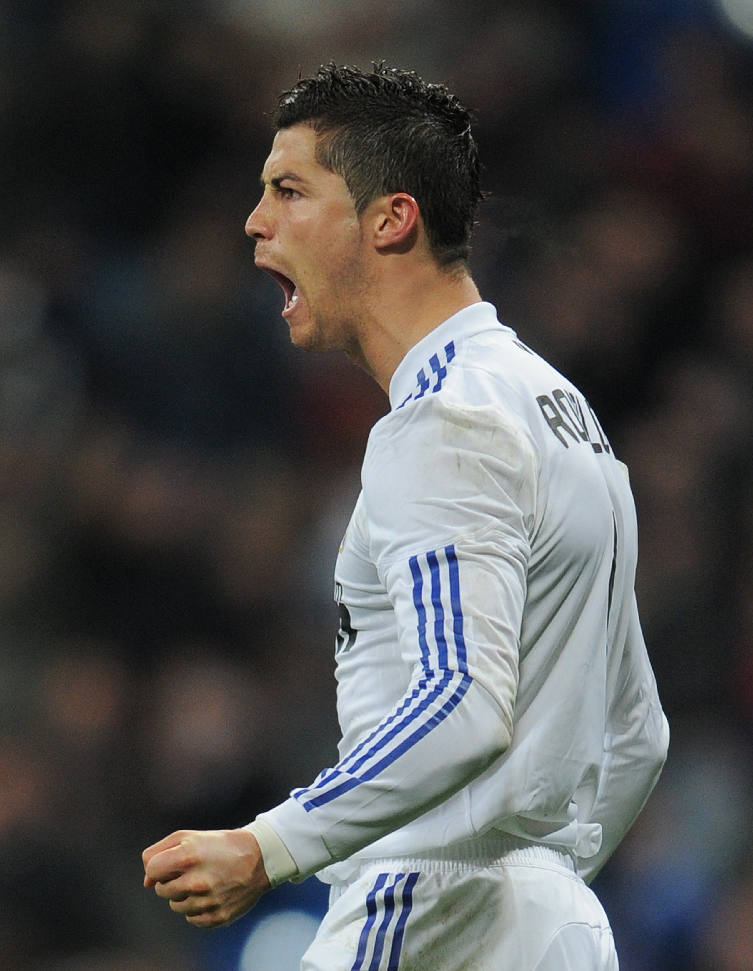 MADRID, SPAIN - MARCH 03:  Cristiano Ronaldo of Real Madrid celebrates scoring from the penalty spot during the la Liga match between Real Madrid and Malaga at Estadio Santiago Bernabeu on March 3, 2011 in Madrid, Spain.  (Photo by Jasper Juinen/Getty Ima