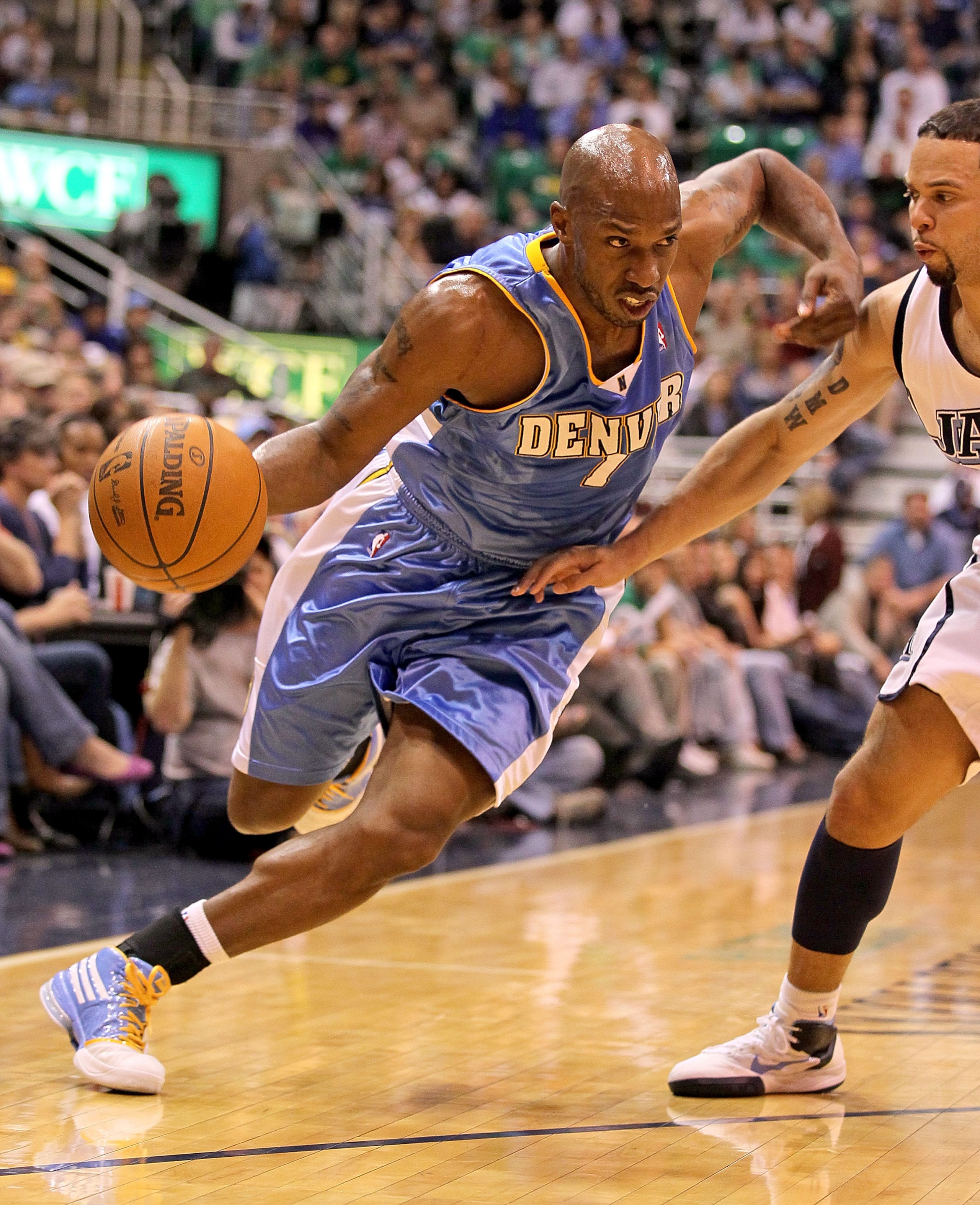 SALT LAKE CITY - APRIL 25: Chauncey Billups #1 of the Denver Nuggets dribbles the ball while defended by Deron Williams #8 of the Utah Jazz during Game Four of the Western Conference Quarterfinals of the 2010 NBA Playoffs at EnergySolutions Arena on Apr SALT LAKE CITY - APRIL 25: Chauncey Billups #1 of the Denver Nuggets dribbles the ball while defended by Deron Williams #8 of the Utah Jazz during Game Four of the Western Conference Quarterfinals of the 2010 NBA Playoffs at EnergySolutions Arena on Apr