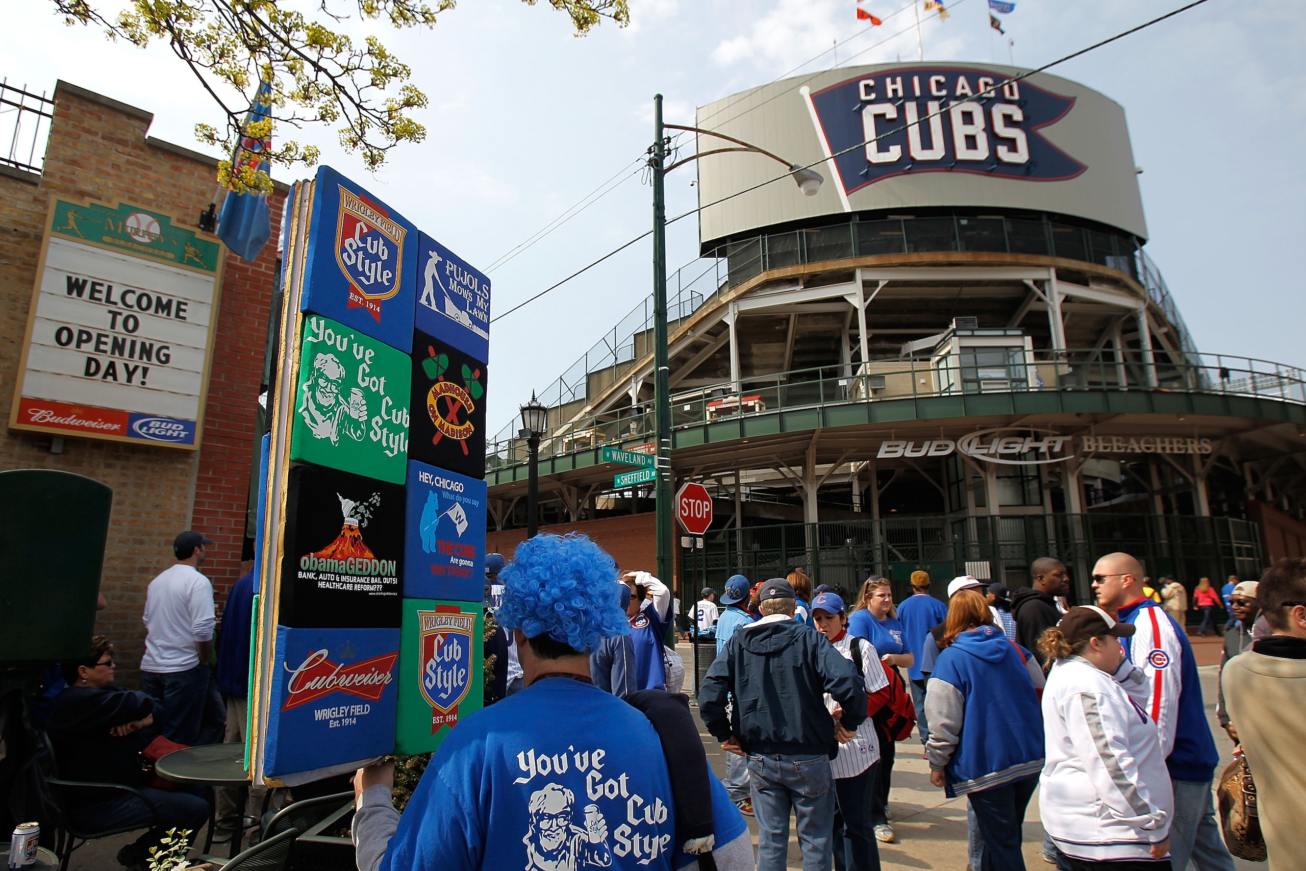 CHICAGO - APRIL 12: A vendor sells shirts as fans wait to enter Wrigley Field before the Opening Day game between the Chicago Cubs and the Milwaukee Brewers on April 12, 2010 in Chicago, Illininois. (Photo by Jonathan Daniel/Getty Images) CHICAGO - APRIL 12: A vendor sells shirts as fans wait to enter Wrigley Field before the Opening Day game between the Chicago Cubs and the Milwaukee Brewers on April 12, 2010 in Chicago, Illininois. (Photo by Jonathan Daniel/Getty Images)