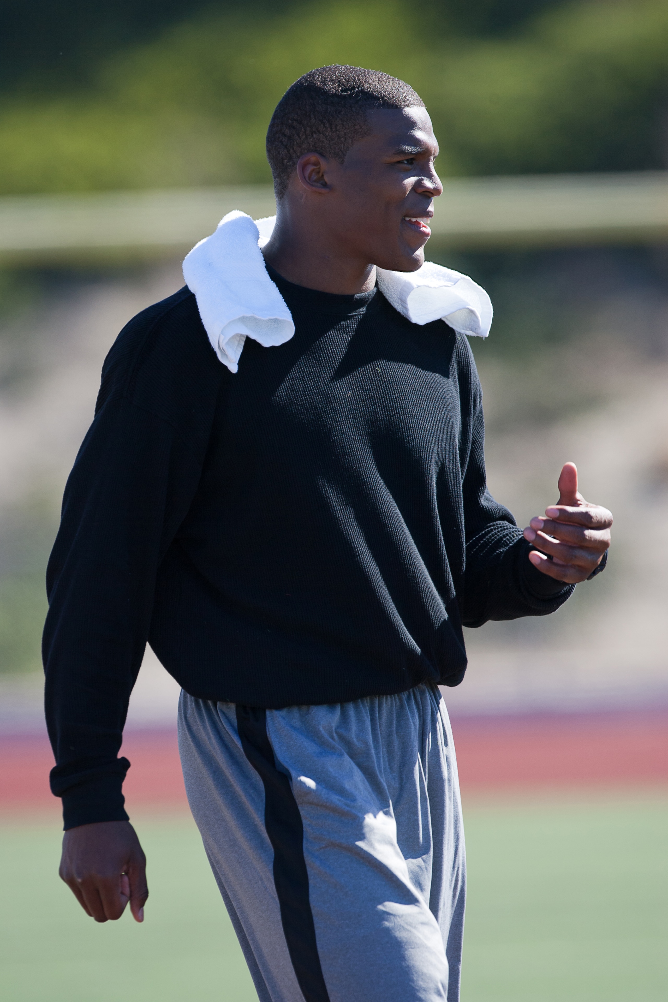 SAN DIEGO, CA - FEBRUARY 10: 2010 Heisman Trophy winning quarterback Cam Newton of Auburn walks off the fiels after his workout routine for the media at Cathedral High School's sports stadium on February 10, 2011 in San Diego, California. (Photo by Kent H