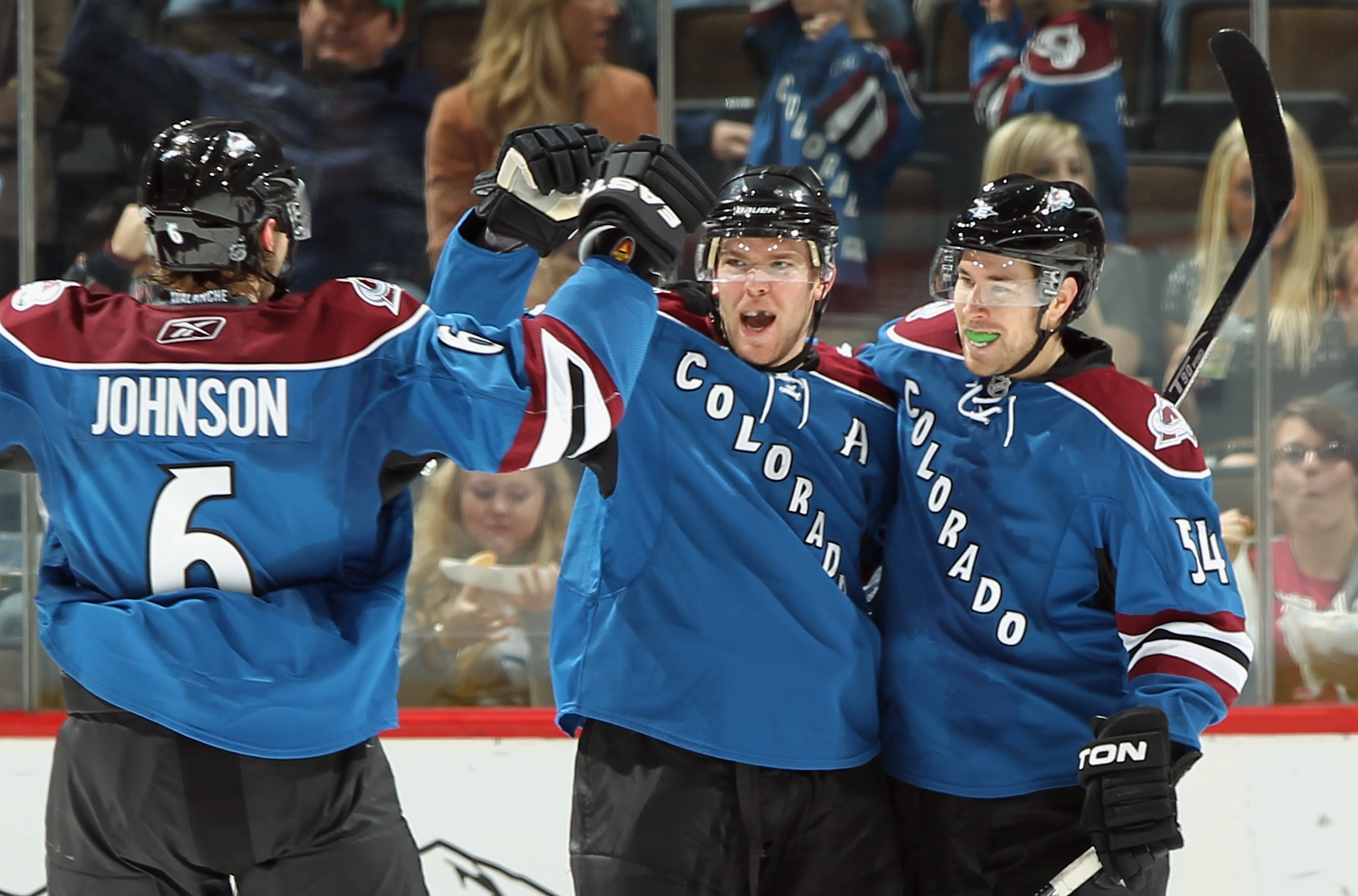 DENVER, CO - MARCH 11:  David Jones #54 of the Colorado Avalanche celebrates his second period goal with teammates Paul Stastny #26 and Erik Johnson #6 against the Anaheim Ducks during NHL action at the Pepsi Center on March 11, 2011 in Denver, Colorado.