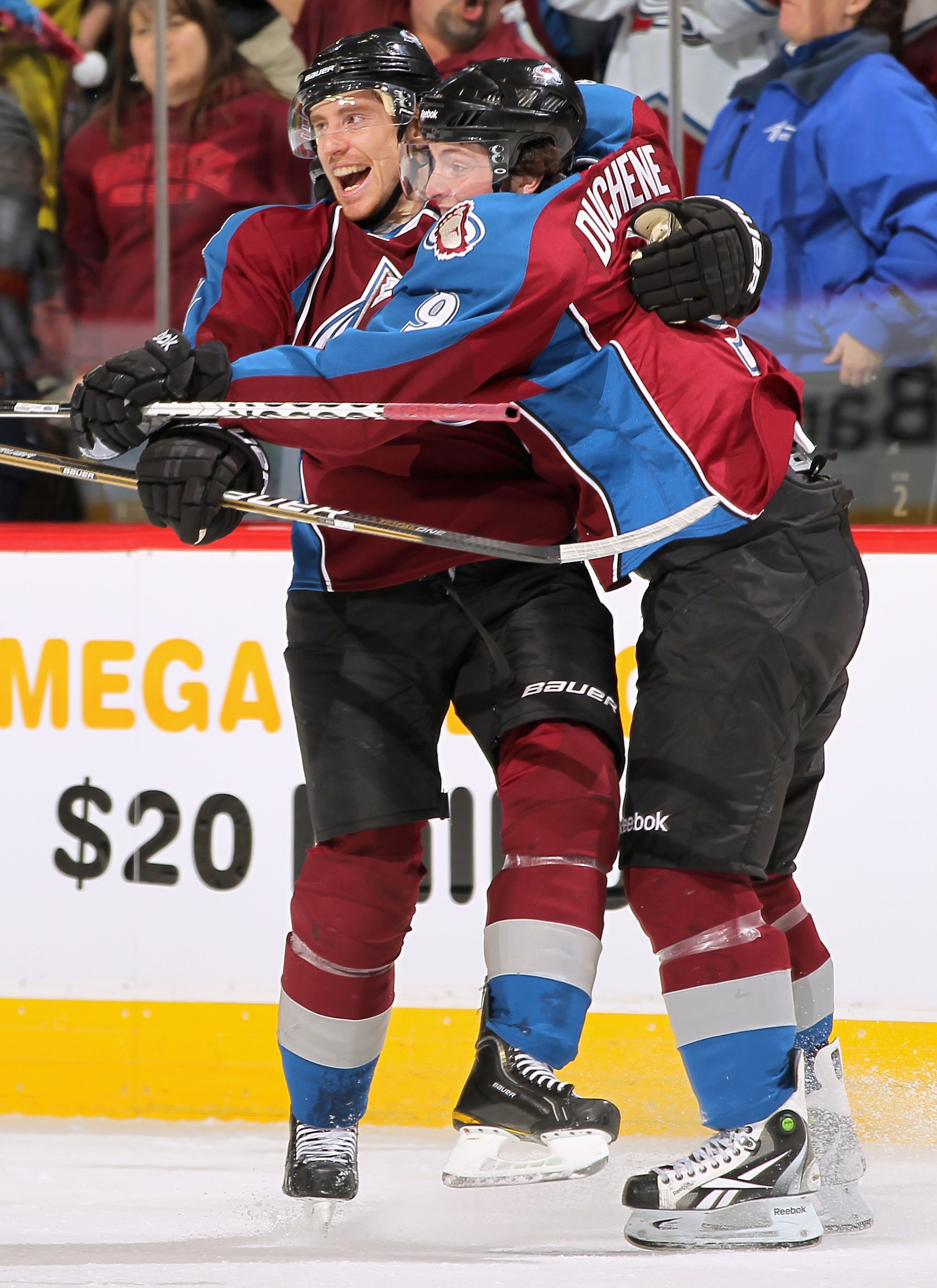 DENVER, CO - JANUARY 10:  Matt Duchene #9 of the Colorado Avalanche celebrates his second goal in the first period with teammate Tomas Fleischmann #14 against  the Detroit Red Wings at the Pepsi Center on January 10, 2011 in Denver, Colorado.  (Photo by D