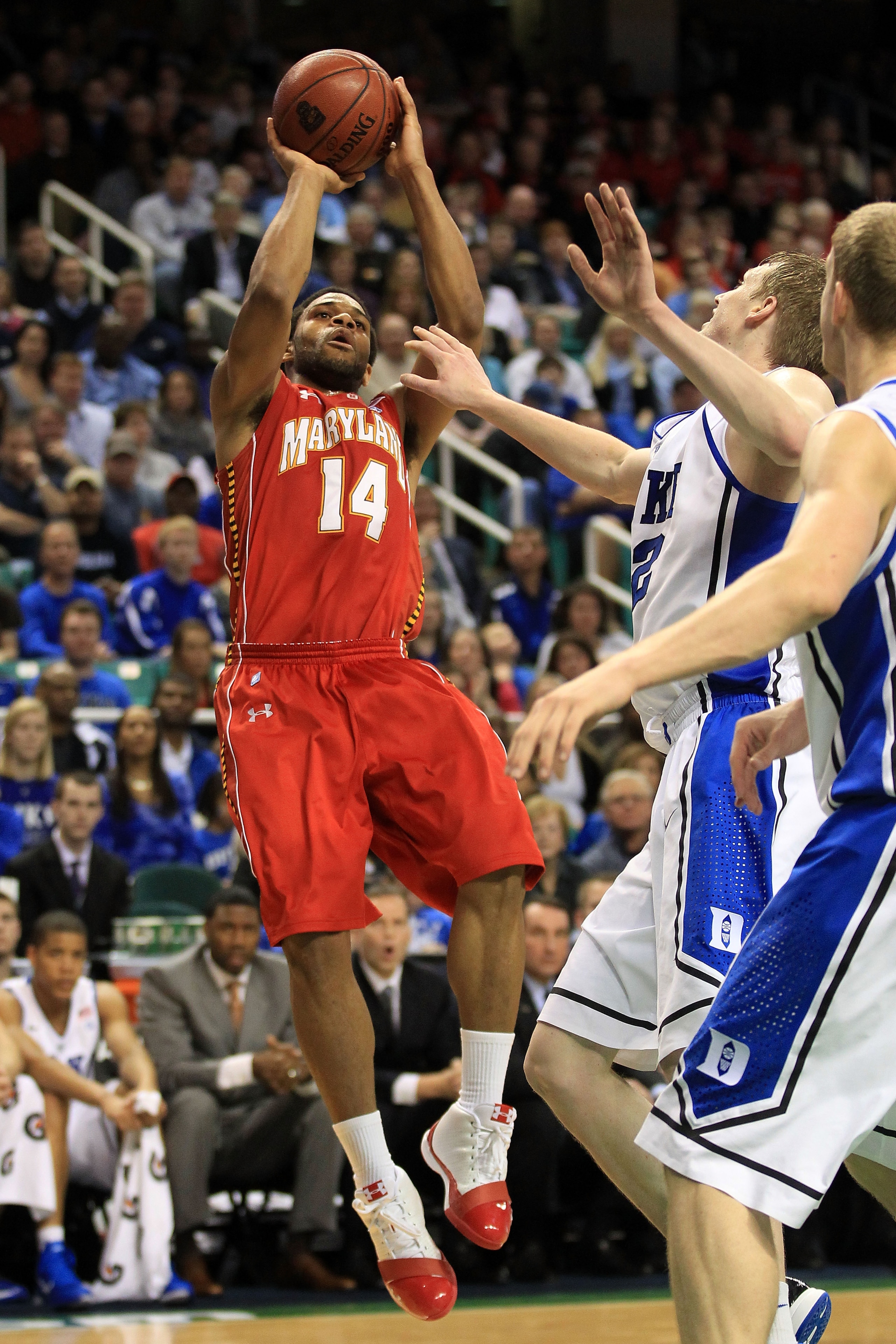 GREENSBORO, NC - MARCH 11:  Sean Mosley #14 of the Maryland Terrapins shoots against the Duke Blue Devils during the first half in the quarterfinals of the 2011 ACC men's basketball tournament at the Greensboro Coliseum on March 11, 2011 in Greensboro, No