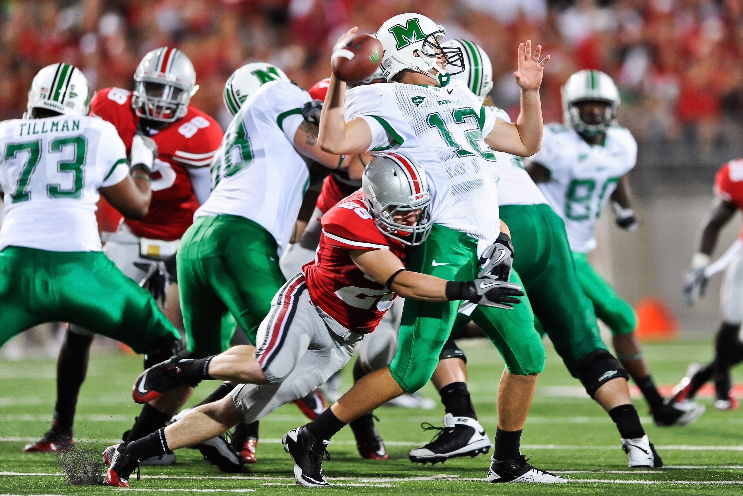 COLUMBUS, OH - SEPTEMBER 2: Tyler Moeller #26 of the Ohio State Buckeyes sacks quarterback Brian Anderson #12 of the Marshall Thundering Herd at Ohio Stadium on September 2, 2010 in Columbus, Ohio. (Photo by Jamie Sabau/Getty Images) COLUMBUS, OH - SEPTEMBER 2: Tyler Moeller #26 of the Ohio State Buckeyes sacks quarterback Brian Anderson #12 of the Marshall Thundering Herd at Ohio Stadium on September 2, 2010 in Columbus, Ohio. (Photo by Jamie Sabau/Getty Images)