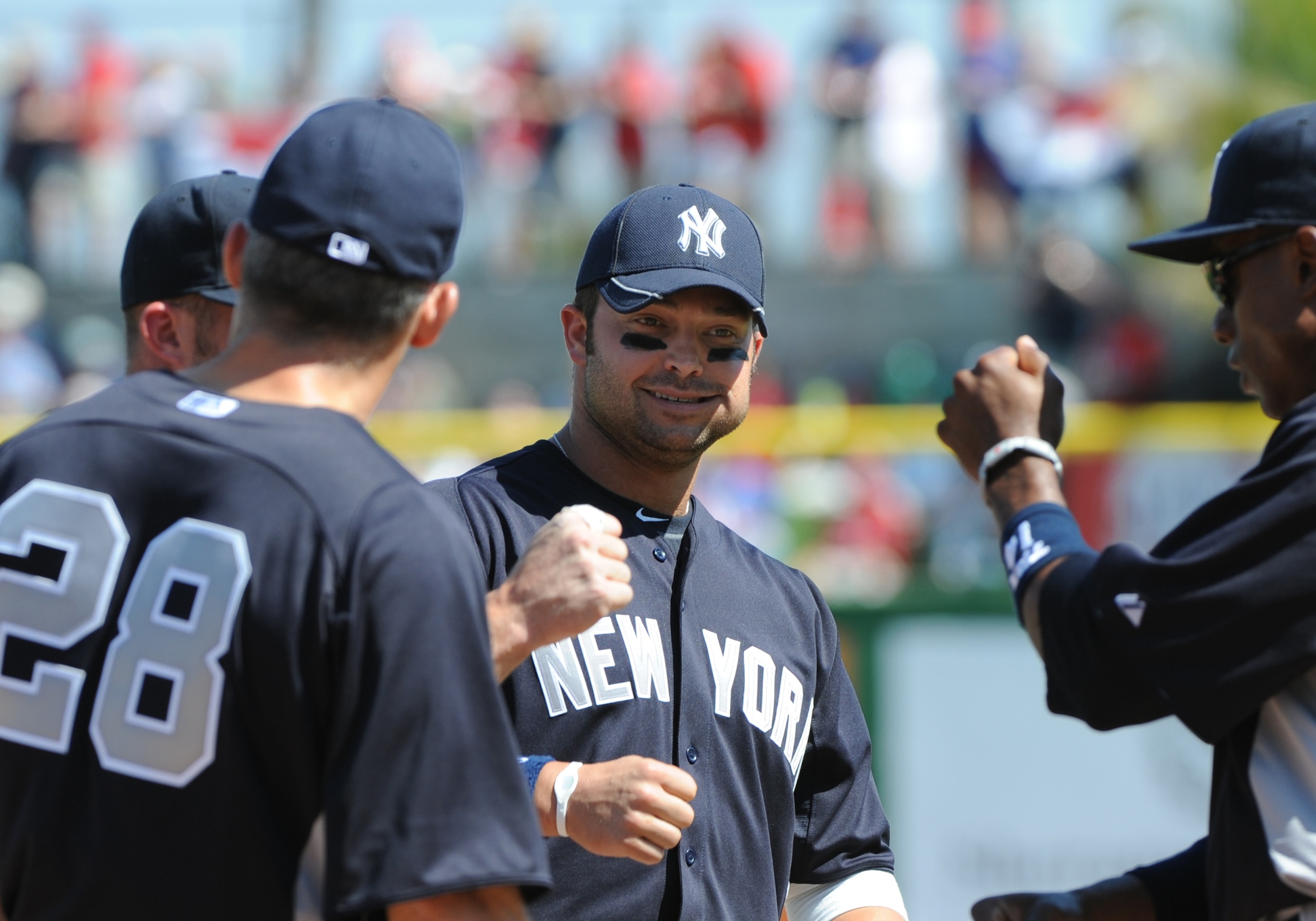 CLEARWATER, FL - FEBRUARY 27:  Outfielder Nick Swisher #33 of the New York Yankees during pre-game introductions against the Philadelphia Phillies February 27, 2011 at Bright House Field in Clearwater, Florida.  (Photo by Al Messerschmidt/Getty Images)
