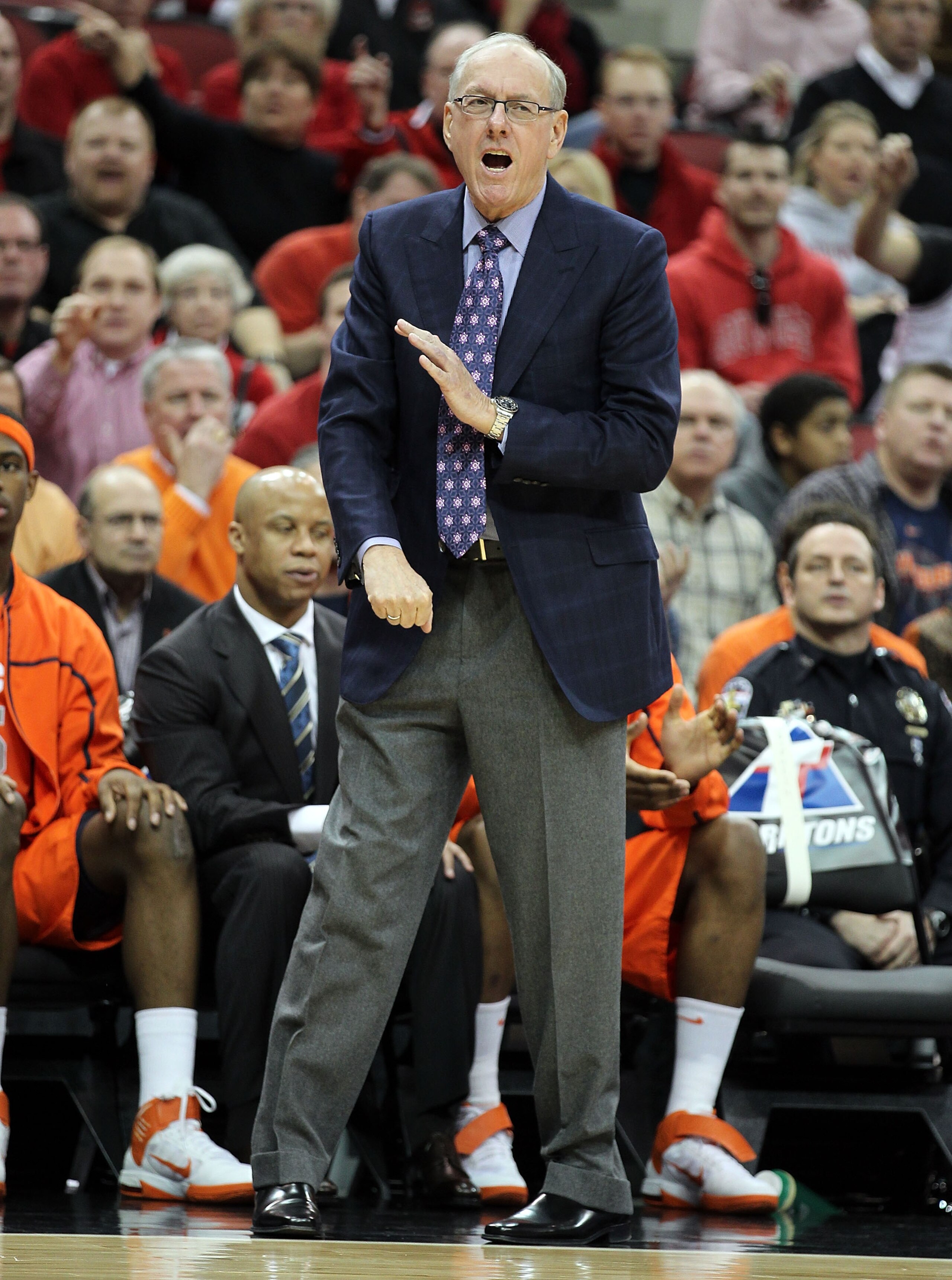 LOUISVILLE, KY - FEBRUARY 12:  Jim Boeheim the Head Coach of the Syracuse Orange gives instructions to his team during the Big East Conference game against the Louisville Cardinals at the KFC Yum! Center on February 12, 2011 in Louisville, Kentucky.  Loui