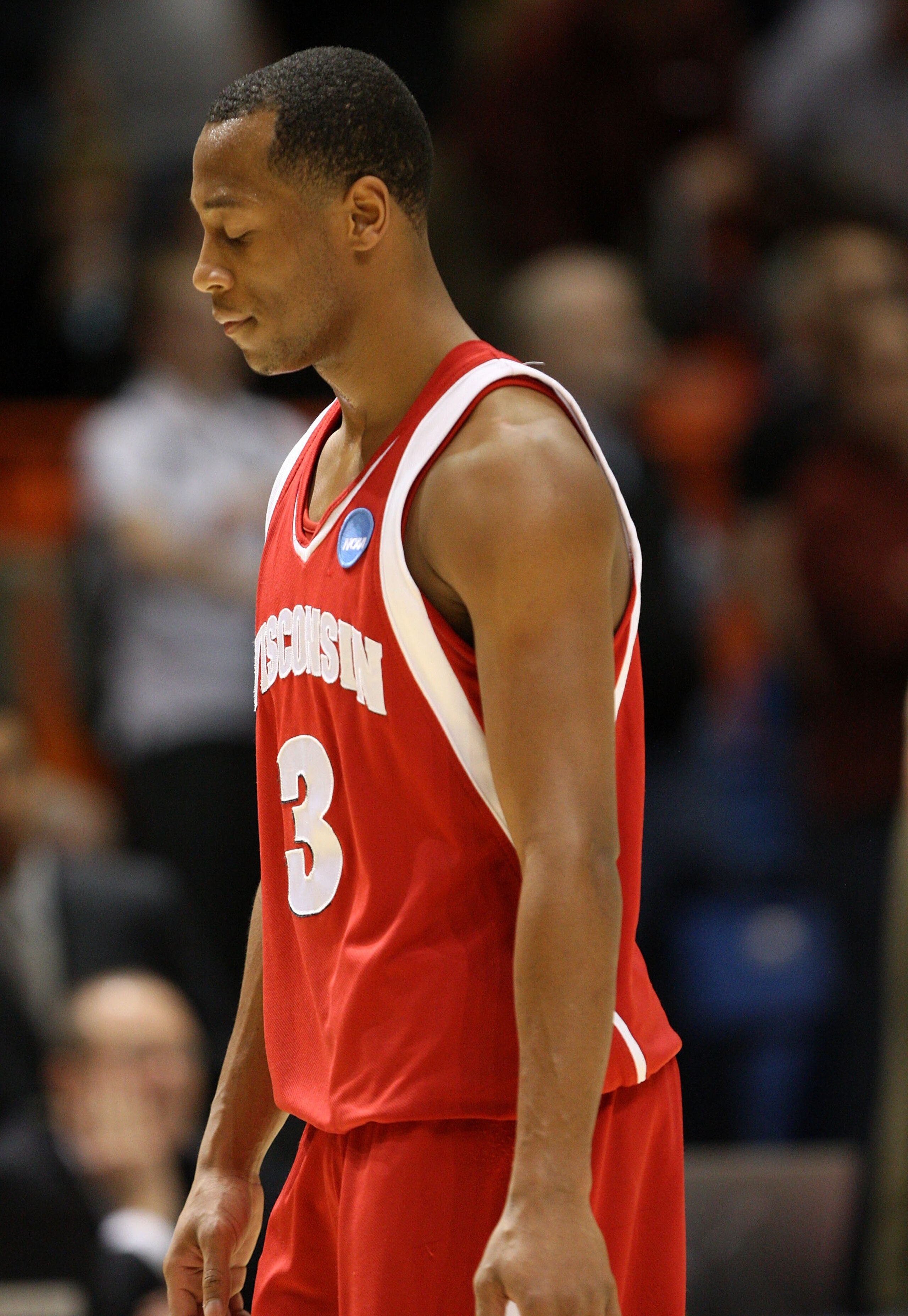 BOISE, ID - MARCH 22:  Guard Trevon Hughes #3 of the Wisconsin Badgers reacts after losing to the Xavier Musketeers 60-49 in the second round of the NCAA Division I Men's Basketball Tournament at the Taco Bell Arena on March 22, 2009 in Boise, Idaho.  (Ph