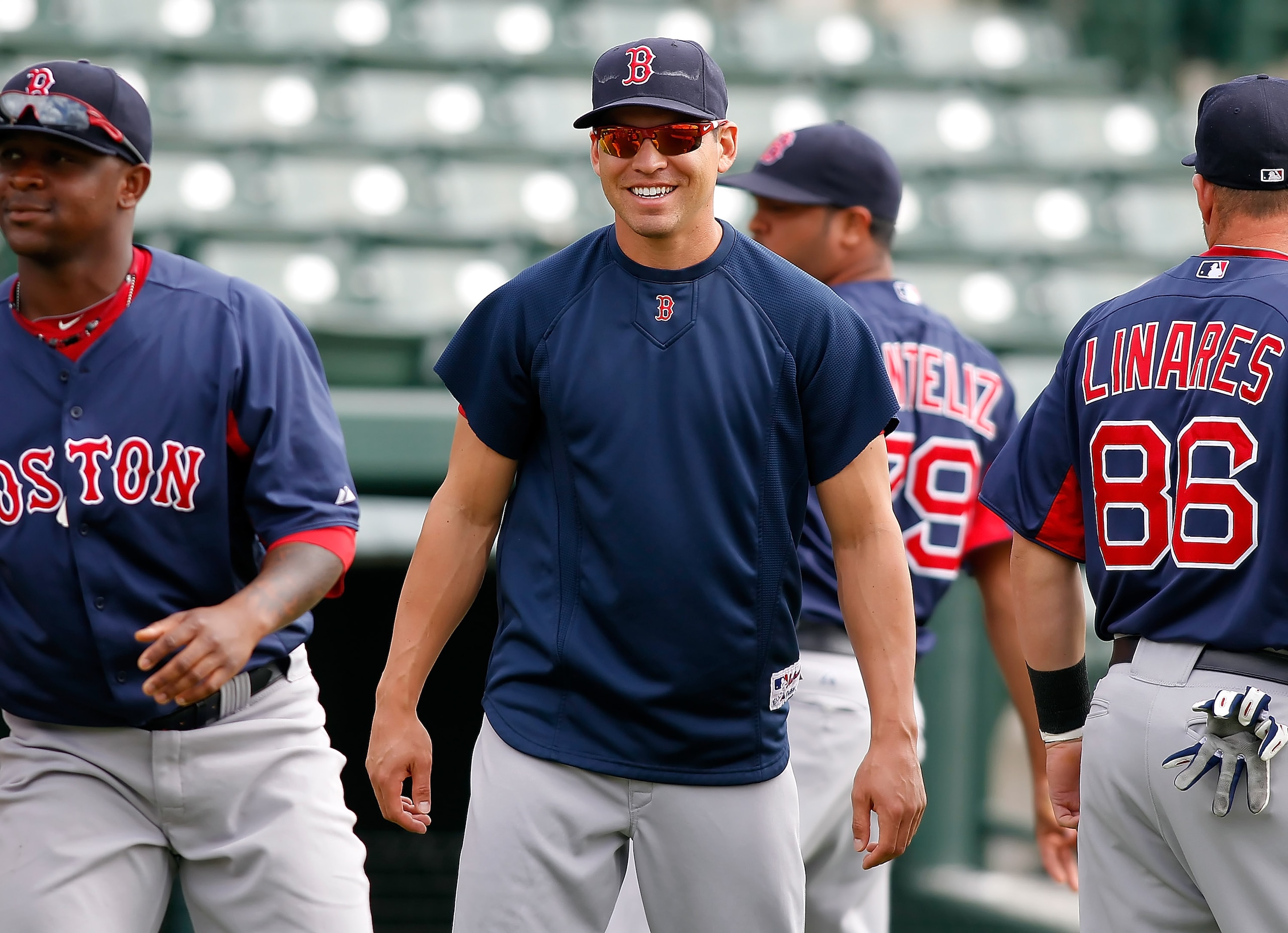 SARASOTA, FL - MARCH 05:  Outfielder Jacoby Ellsbury #2 of the Boston Red Sox warms up just before the start of the Grapefruit League Spring Training Game against the Baltimore Orioles at Ed Smith Stadium on March 5, 2011 in Sarasota, Florida.  (Photo by