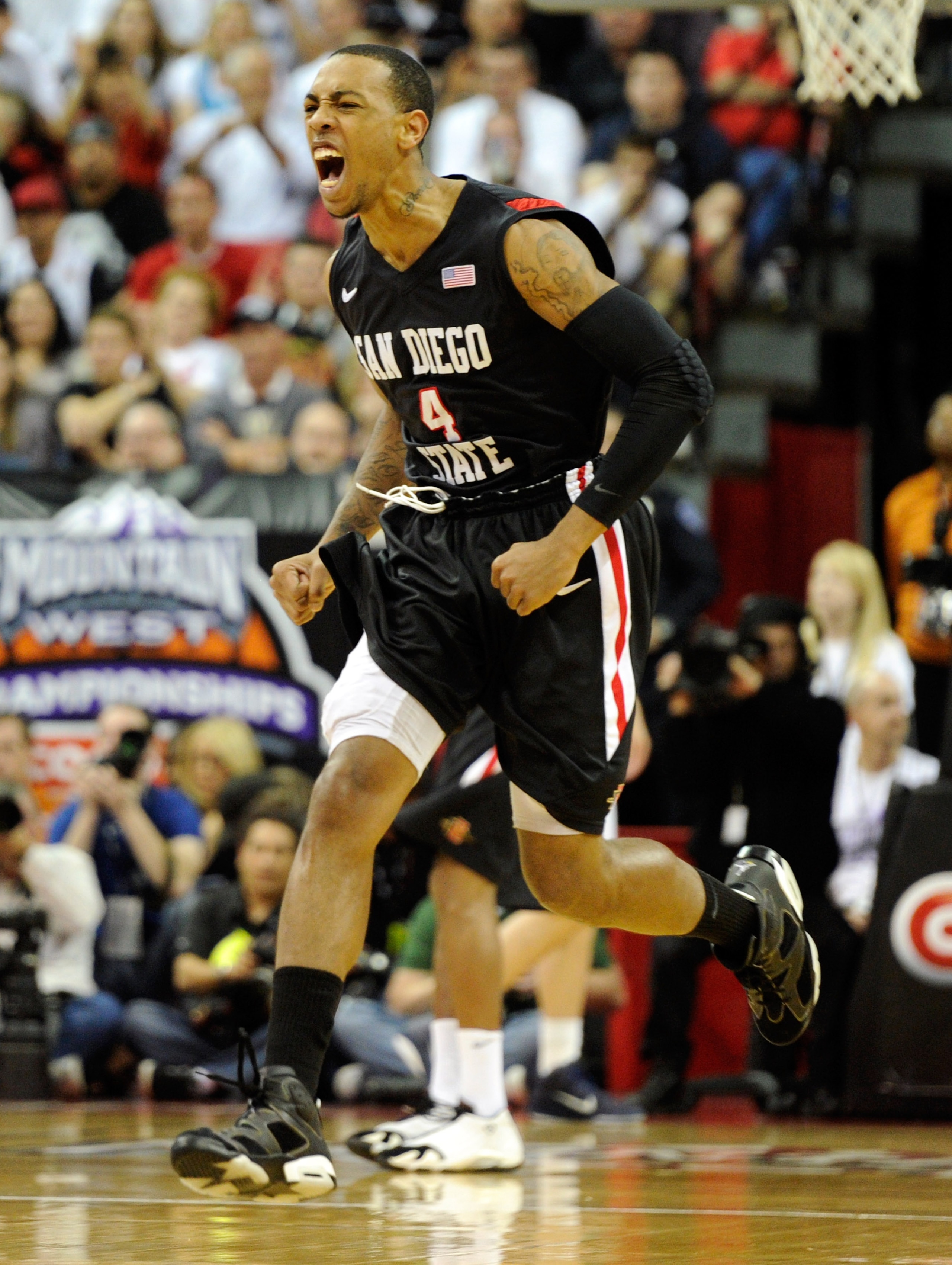 LAS VEGAS, NV - MARCH 12:  Malcolm Thomas #4 of the San Diego State Aztecs reacts during the championship game of the Conoco Mountain West Conference Basketball tournament against the Brigham Young University Cougars at the Thomas & Mack Center March 12,