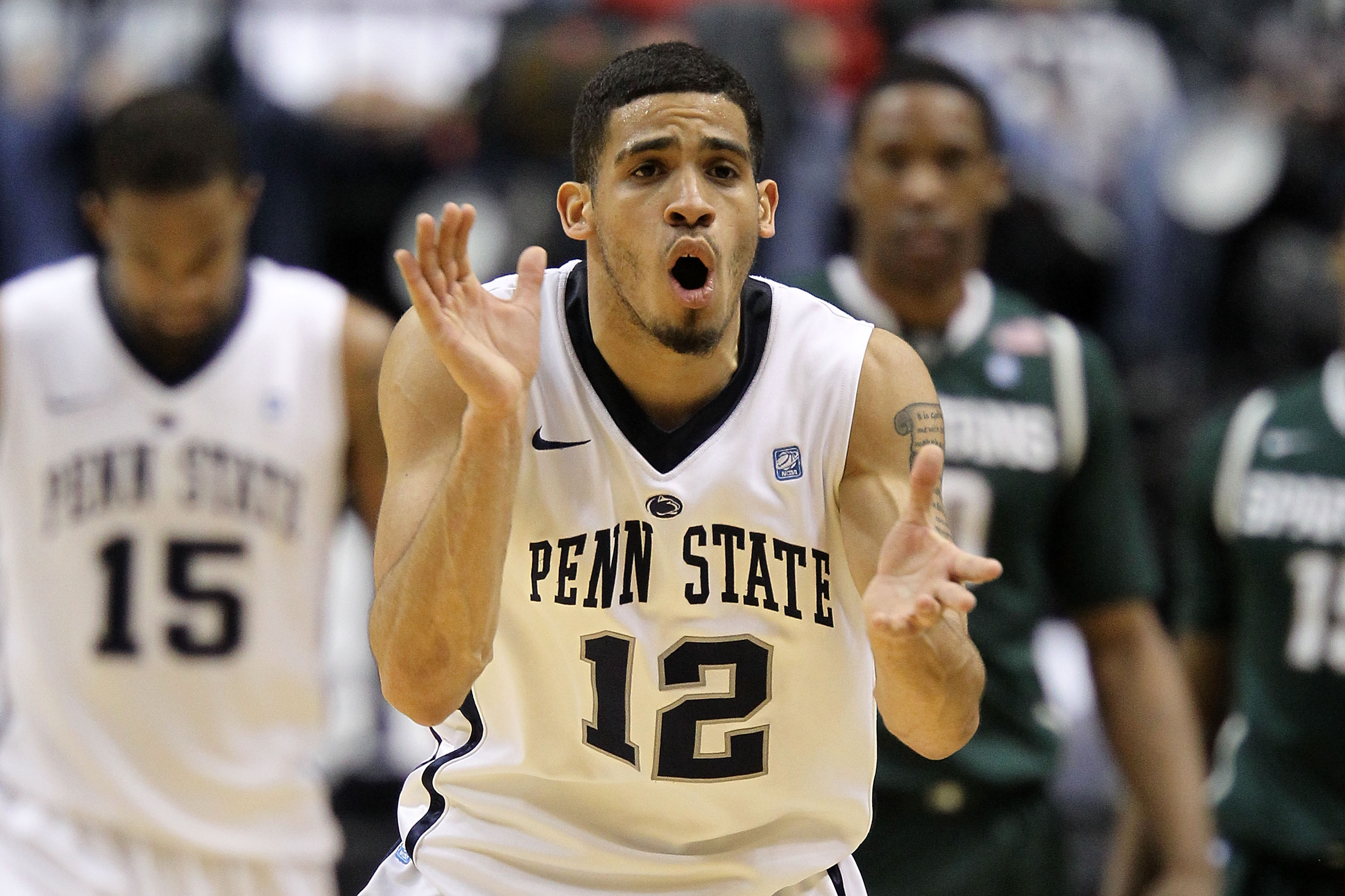 INDIANAPOLIS, IN - MARCH 12: Talor Battle #12 of the Penn State Nittany Lions reacts to a play against the Michigan State Spartans during the semifinals of the 2011 Big Ten Men's Basketball Tournament at Conseco Fieldhouse on March 12, 2011 in Indianapol