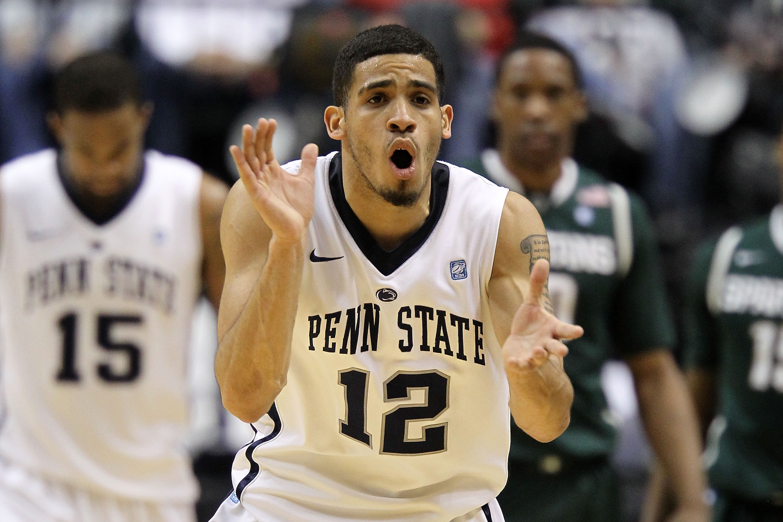 INDIANAPOLIS, IN - MARCH 12:  Talor Battle #12 of the Penn State Nittany Lions reacts to a play against the Michigan State Spartans during the semifinals of the 2011 Big Ten Men's Basketball Tournament at Conseco Fieldhouse on March 12, 2011 in Indianapol