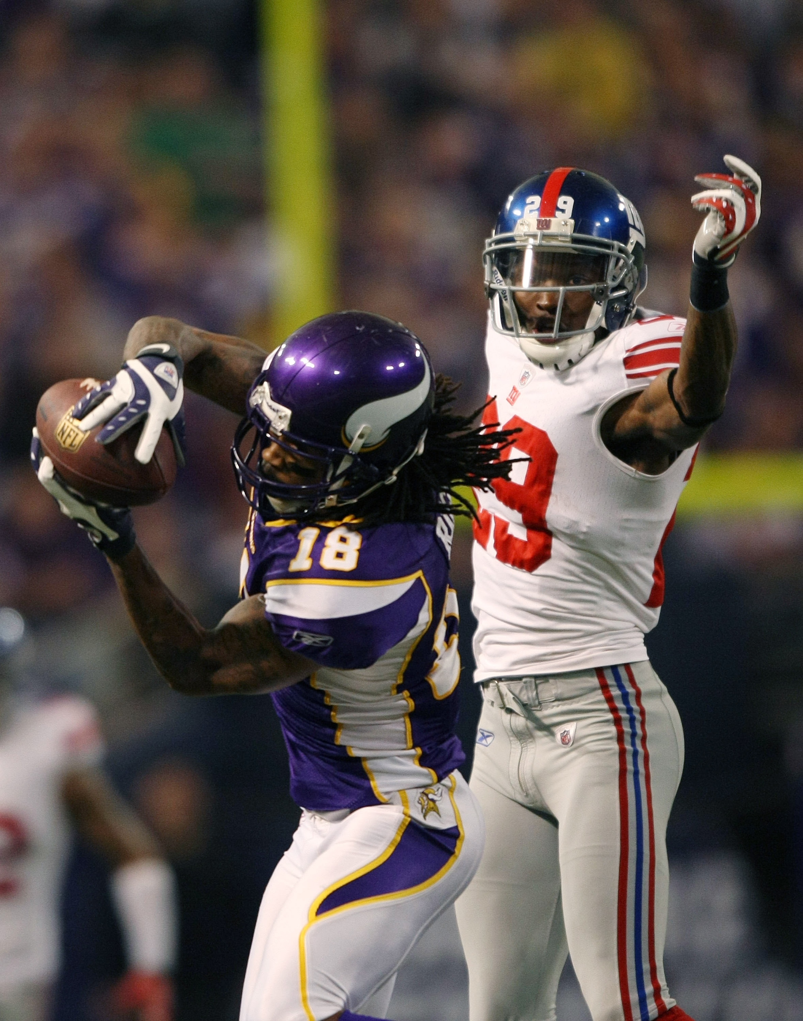 MINNEAPOLIS - JANUARY 03:  Sidney Rice #18 of the Minnesota Vikings makes the catch as D.J. Johnson #29 of the New York Giants defends on January 3, 2010 at Hubert H. Humphrey Metrodome in Minneapolis, Minnesota.  (Photo by Elsa/Getty Images)