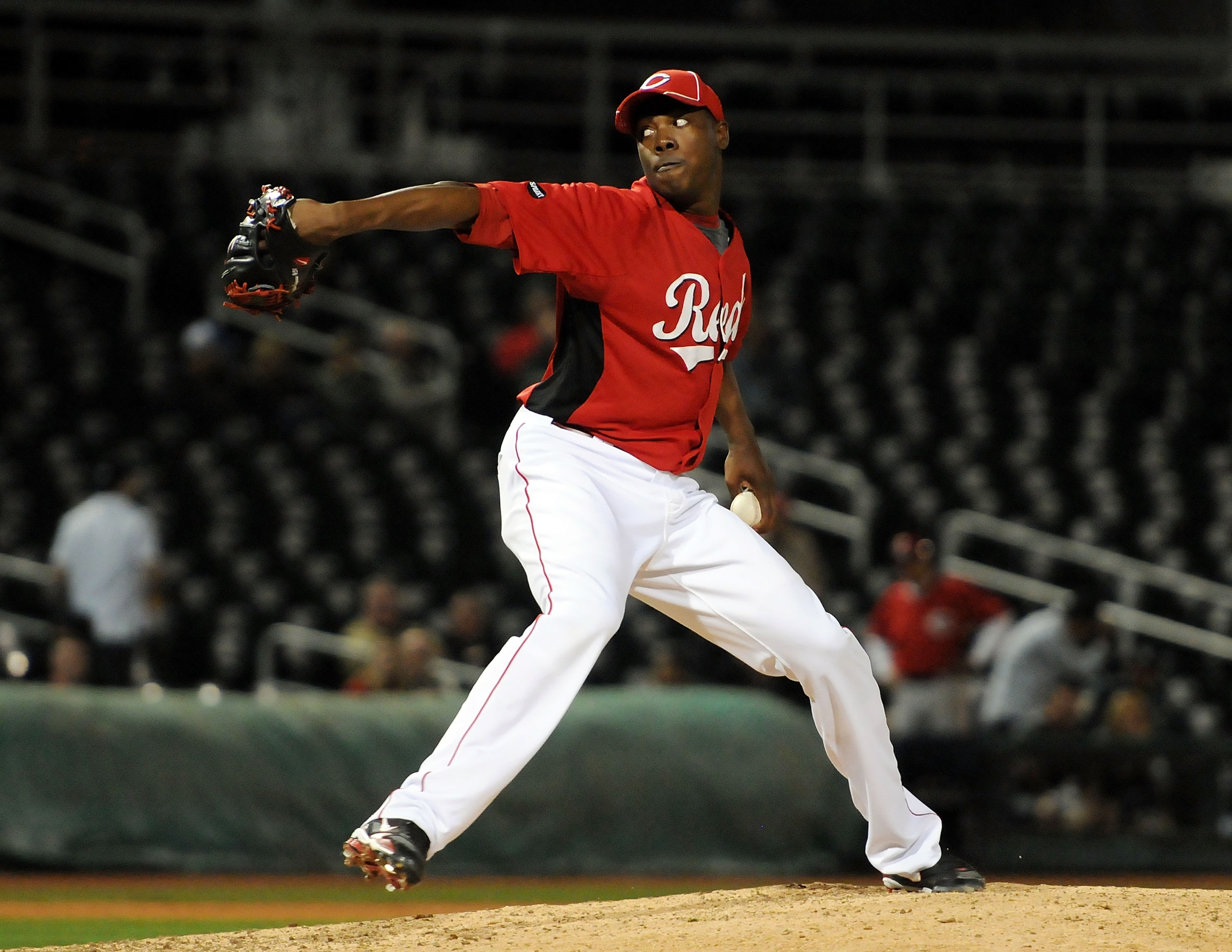 GOODYEAR, AZ - MARCH 03:  Aroldis Chapman #54 of the Cincinnati Reds delivers a pitch to the Los Angeles Dodgers at Goodyear Ballpark on March 3, 2011 in Goodyear, Arizona.  (Photo by Norm Hall/Getty Images)
