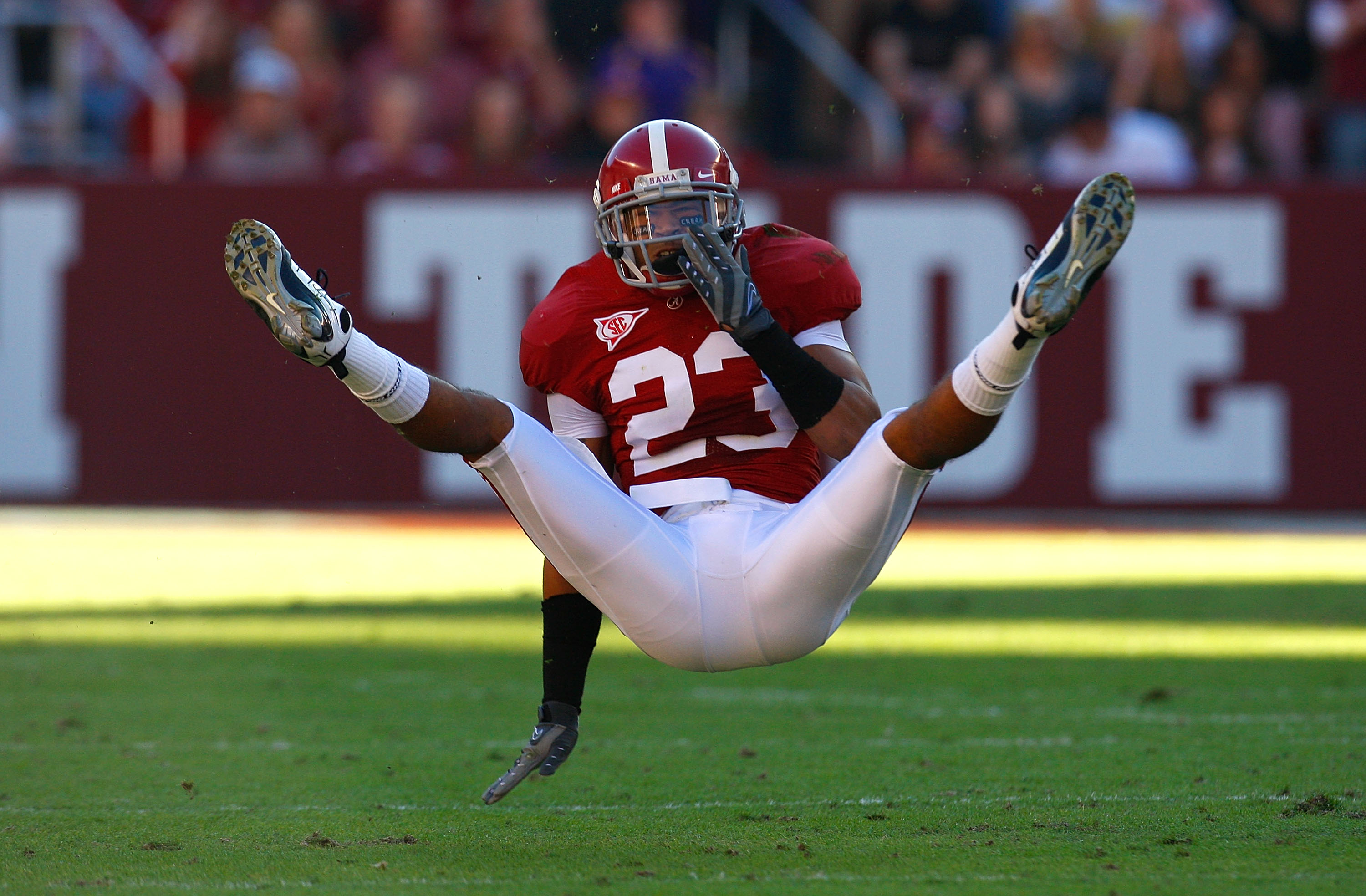 TUSCALOOSA, AL - NOVEMBER 07:  Robby Green #23 of the Alabama Crimson Tide falls to the ground after a near interception against the Louisiana State University Tigers at Bryant-Denny Stadium on November 7, 2009 in Tuscaloosa, Alabama.  (Photo by Kevin C.