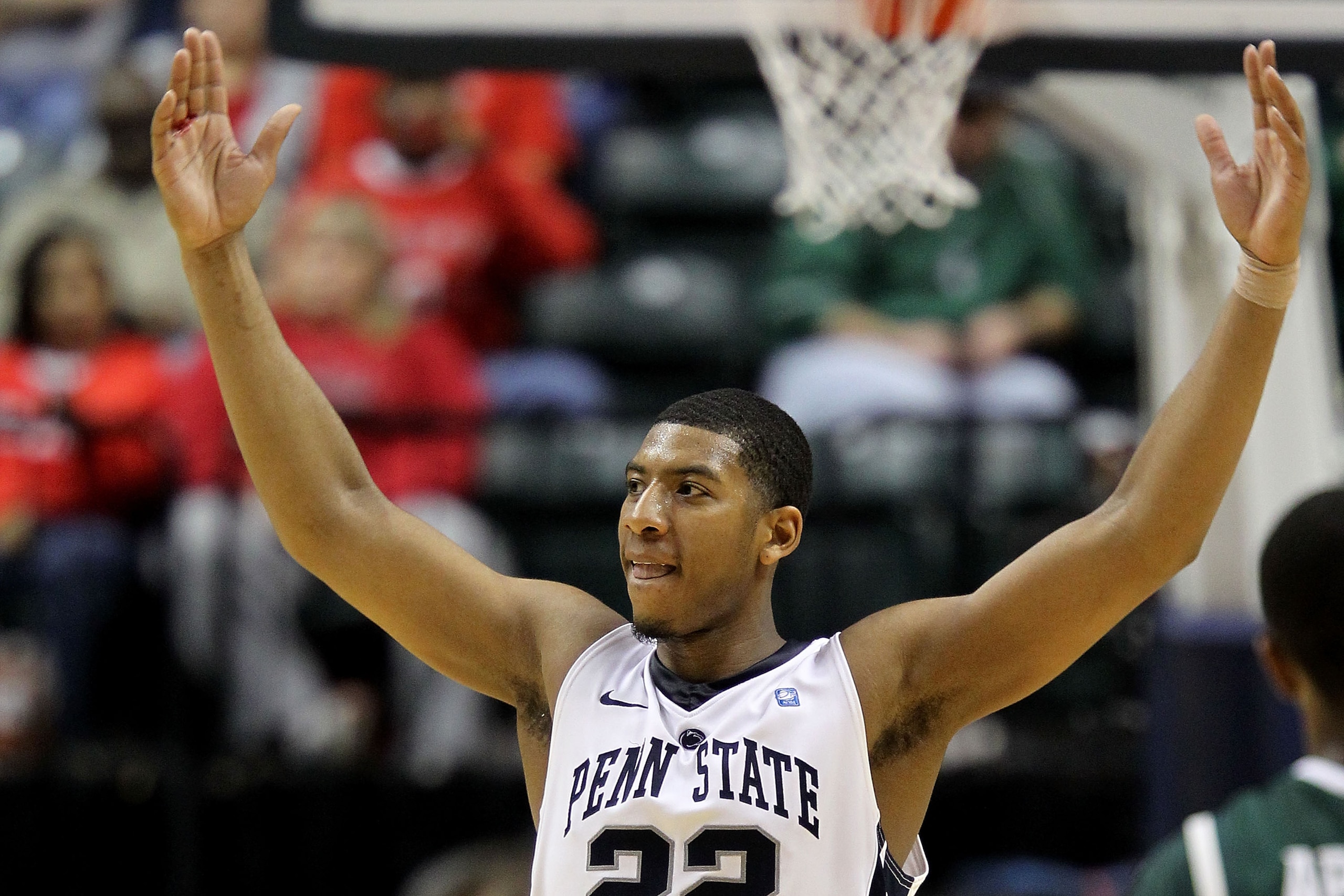 INDIANAPOLIS, IN - MARCH 12:  Andrew Jones #22 of the Penn State Nittany Lions celebrates after Penn State won 61-48 against the Michigan State Spartans during the semifinals of the 2011 Big Ten Men's Basketball Tournament at Conseco Fieldhouse on March 1