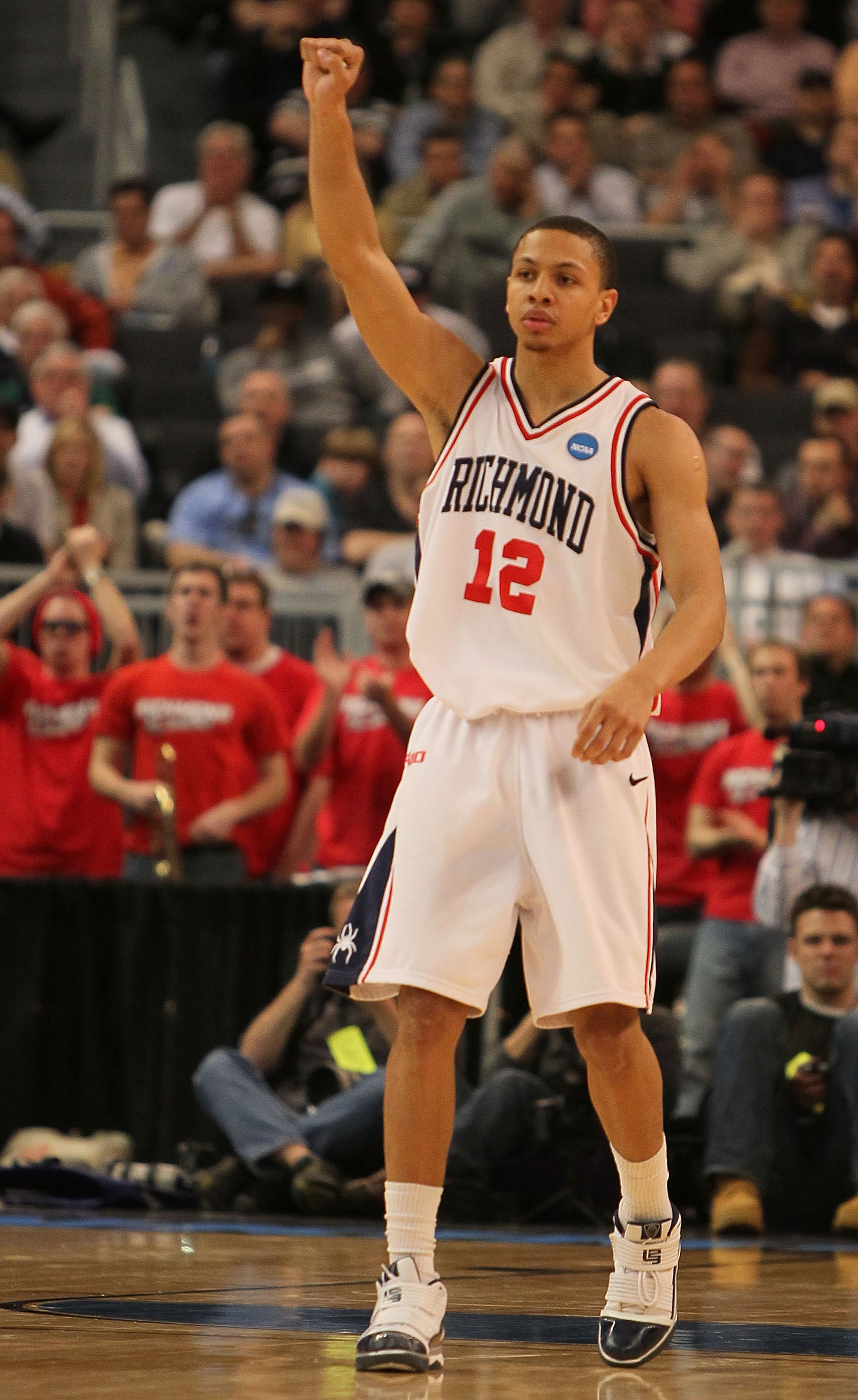 PROVIDENCE, RI - MARCH 18: Kevin Smith #12 of the Richmond Spiders reacts the Saint Mary's Gaels during the first round of the 2010 NCAA men's basketball tournament at Dunkin' Donuts Center on March 18, 2010 in Providence, Rhode Island. (Jim Rogash/Getty