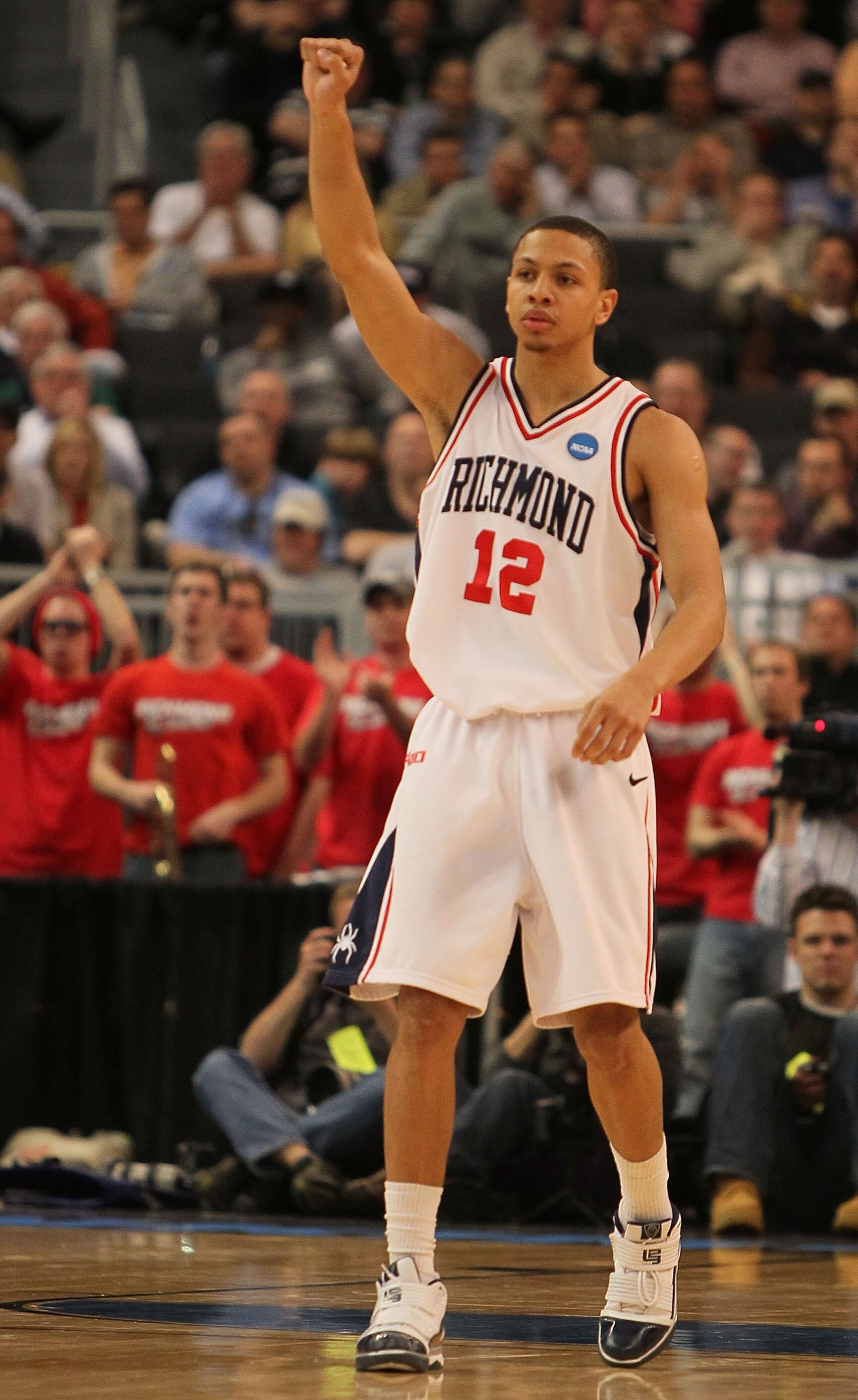 PROVIDENCE, RI - MARCH 18: Kevin Smith #12 of the Richmond Spiders reacts the Saint Mary's Gaels during the first round of the 2010 NCAA men's basketball tournament at Dunkin' Donuts Center on March 18, 2010 in Providence, Rhode Island. (Jim Rogash/Getty