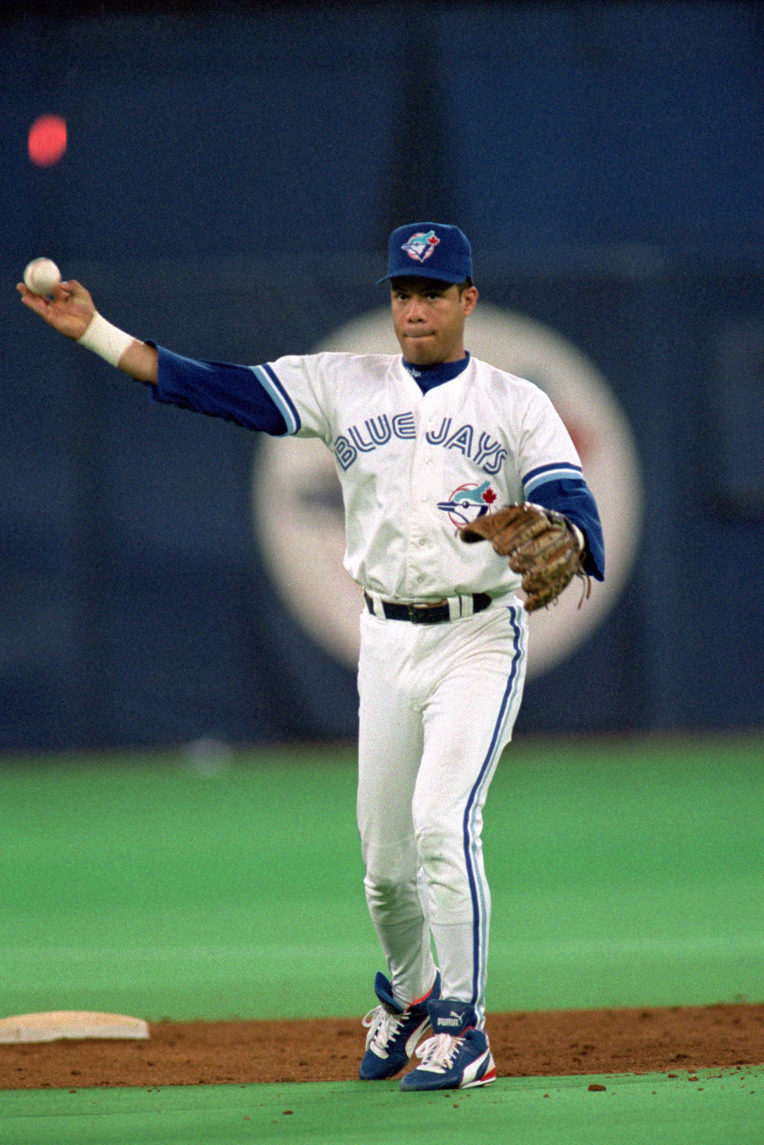 TORONTO - OCTOBER 17:  Roberto Alomar #12 of the Toronto Blue Jays throws the ball during game 2 of the World Series against the Philadelphia Phillies at the SkyDome in Toronto, Ontario, Canada, on October 17, 1993.  The Phillies won 6-4. (Photo by Rick S