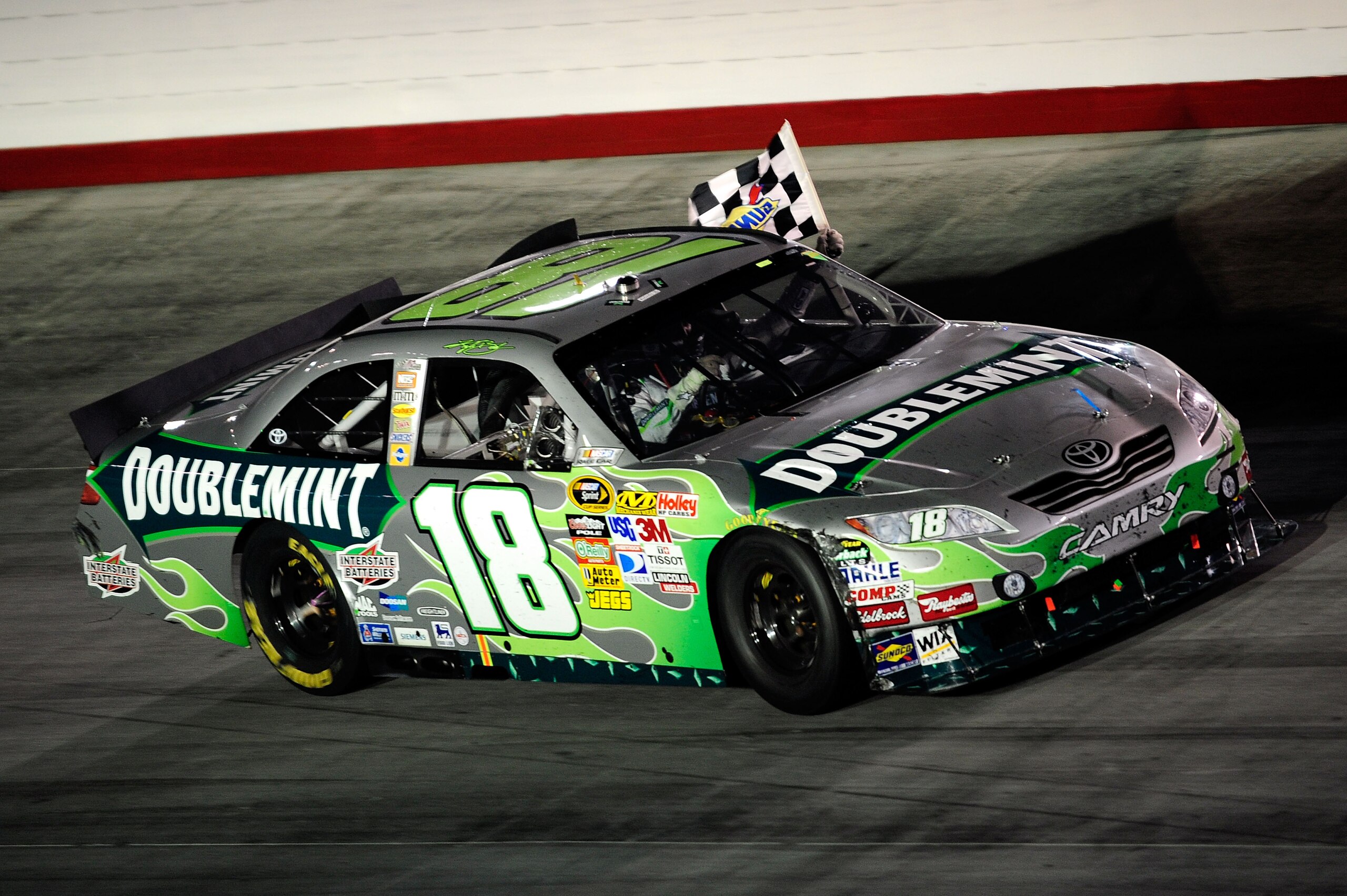 BRISTOL, TN - AUGUST 21:  Kyle Busch, driver of the #18 Doublemint Toyota, celebrates on track after winning the NASCAR Sprint Cup Series IRWIN Tools Night Race at Bristol Motor Speedway on August 21, 2010 in Bristol, Tennessee.  (Photo by Getty Images/Ge