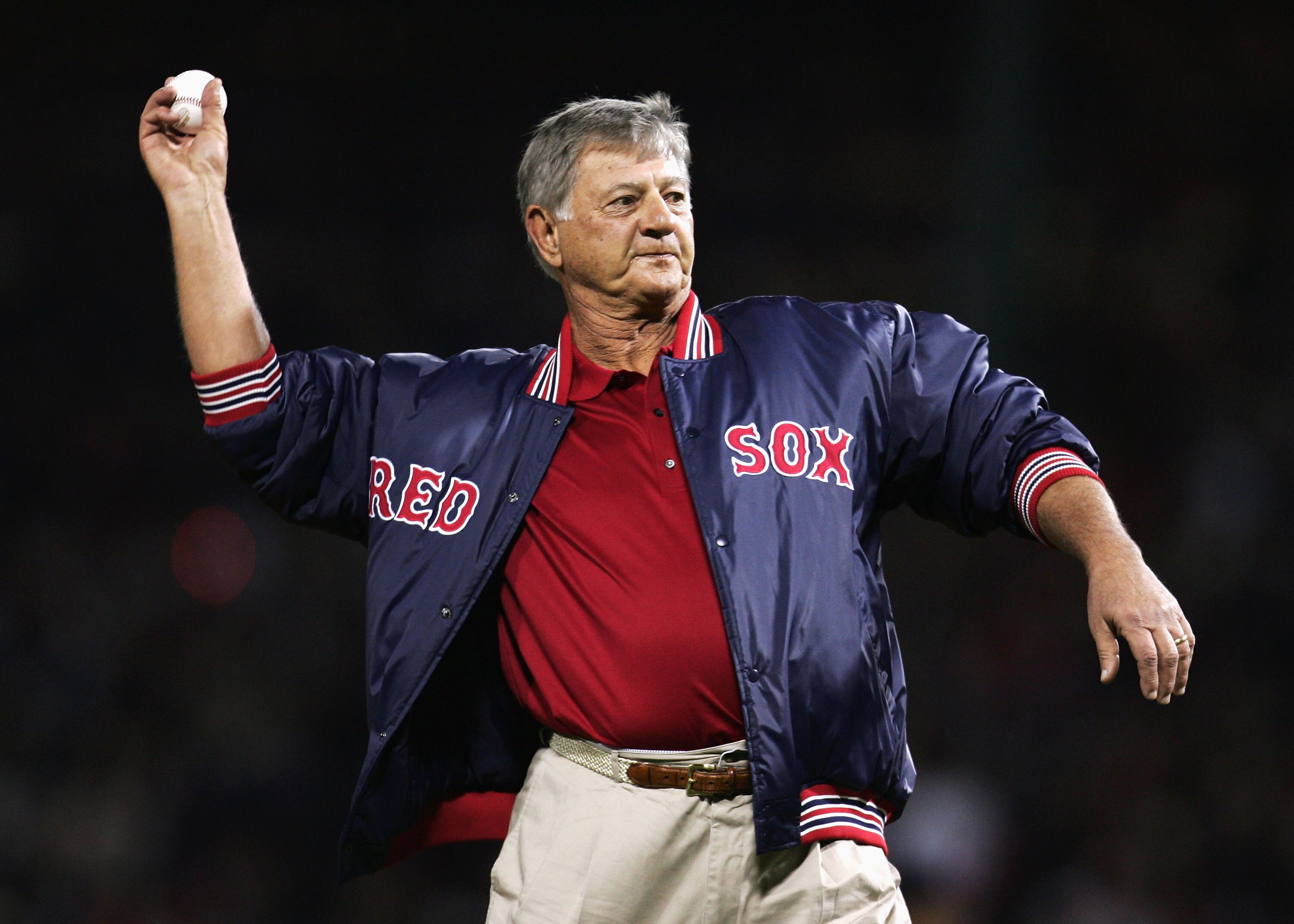 BOSTON - OCTOBER 23:  Boston Red Sox hall of famer Carl Yastrzemski throws out the first pitch before game one of the World Series between the St. Louis Cardinals and the Red Sox on October 23, 2004 at Fenway Park in Boston, Massachusetts. (Photo by Al Be