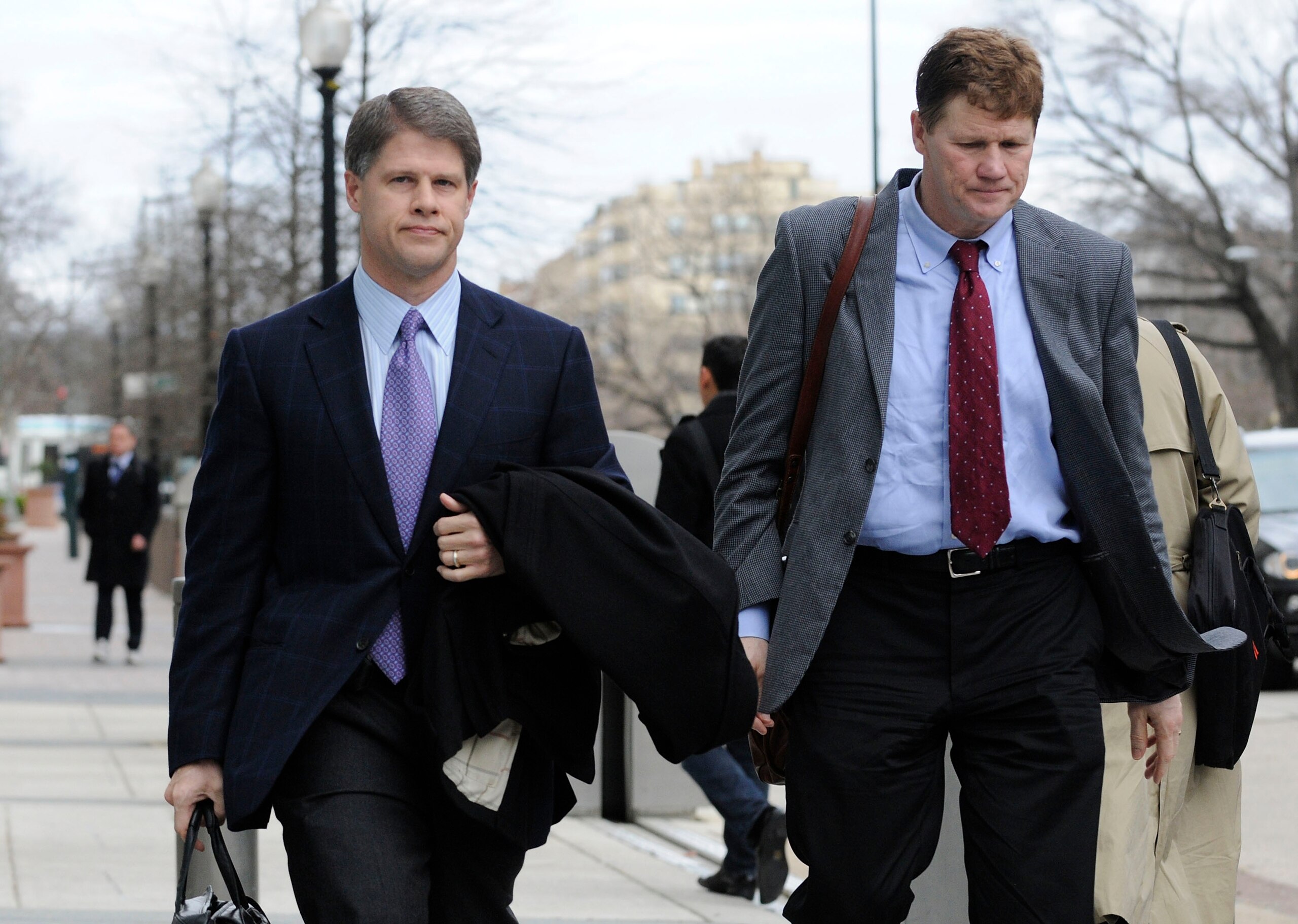WASHINGTON, DC - MARCH 11: Kansas City Chiefs owner Clark Hunt (L) and Green Bay Packers CEO Mark Murphy (R) arrive for labor talks at the Federal Mediation and Conciliation Service building March 11, 2011 in Washington, DC. Representatives from the Natio