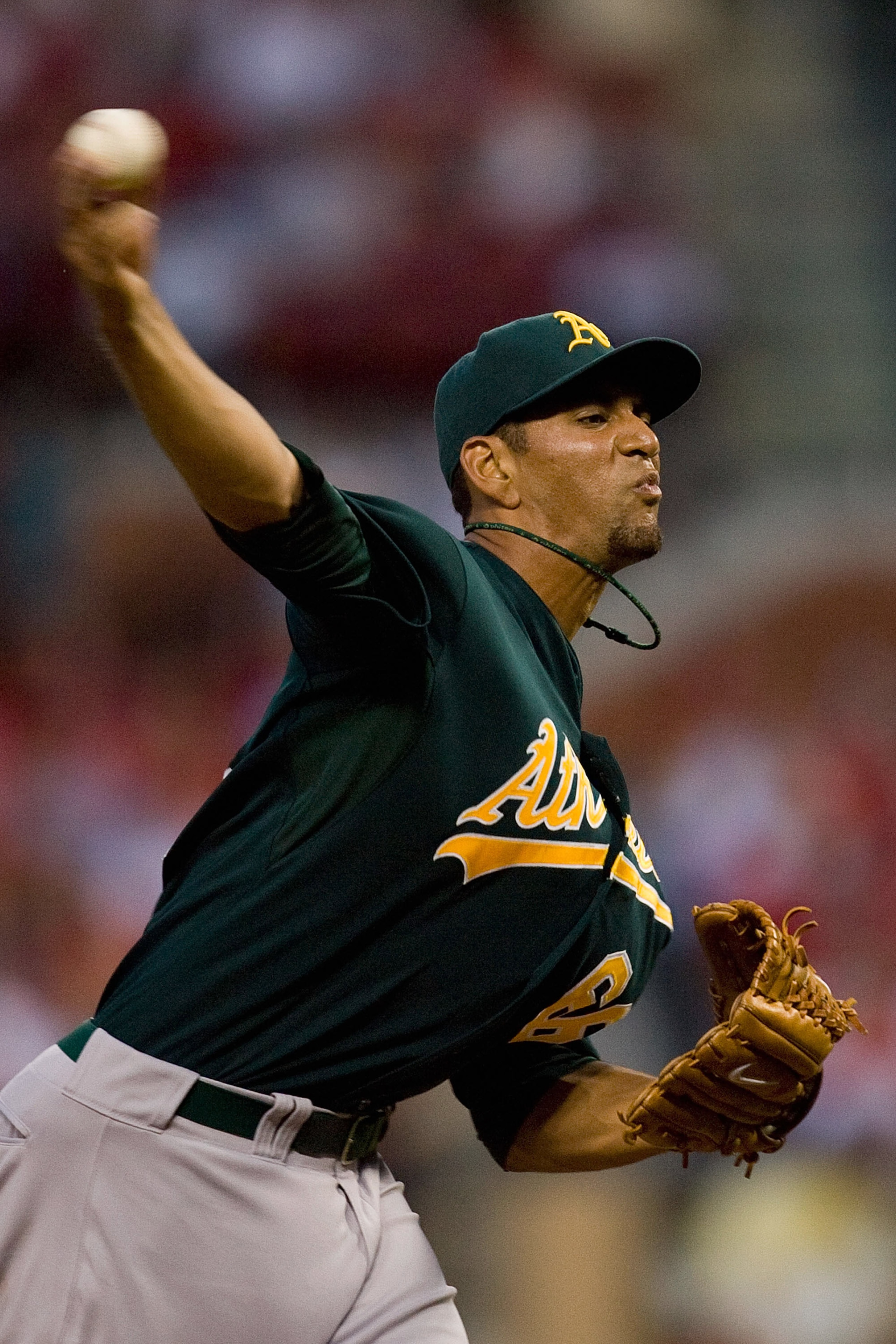 ST. LOUIS - JUNE 19: Relief pitcher Tyson Ross #66 of the Oakland Athletics throws against the St. Louis Cardinals at Busch Stadium on June 19, 2010 in St. Louis, Missouri. (Photo by Dilip Vishwanat/Getty Images) ST. LOUIS - JUNE 19: Relief pitcher Tyson Ross #66 of the Oakland Athletics throws against the St. Louis Cardinals at Busch Stadium on June 19, 2010 in St. Louis, Missouri. (Photo by Dilip Vishwanat/Getty Images)