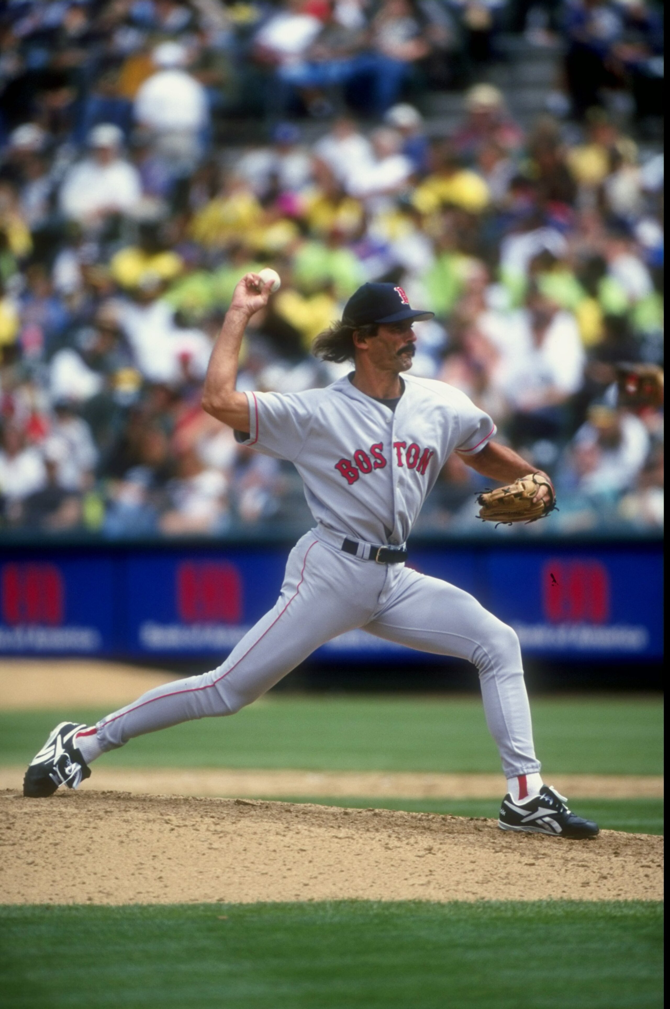 30 Jul 1998:  Pitcher Dennis Eckersley #43 of the Boston Red Sox winds up for the pitch during a game against the Oakland Athletics at the Oakland Coliseum in Oakland, California. The Athletics defeated the Red Sox 6-5. Mandatory Credit: Otto Greule Jr.