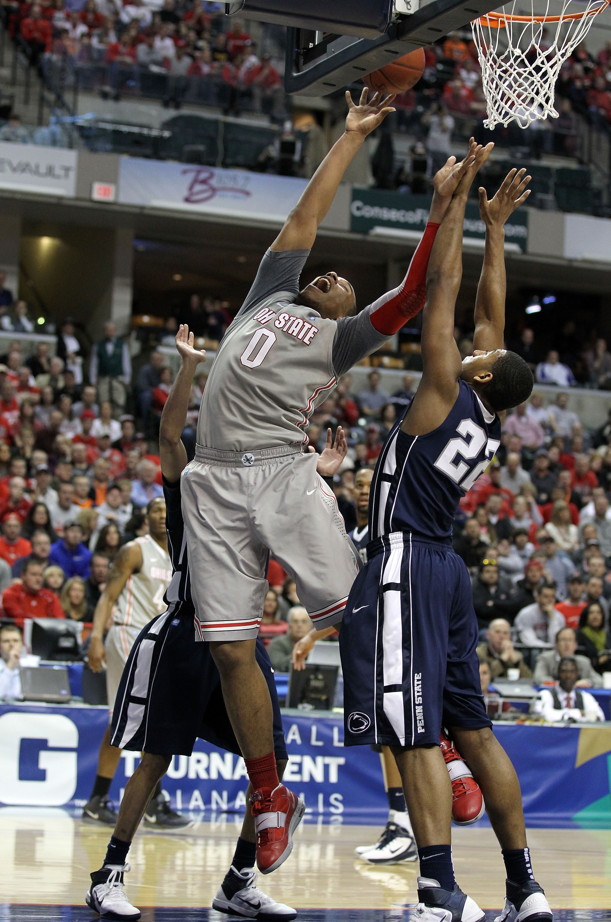 INDIANAPOLIS, IN - MARCH 13:  Jared Sullinger #0 of the Ohio State Buckeyes goes up for a shot attempt against the Andrew Jones #22 of the Penn State Nittany Lions during the championship game of the 2011 Big Ten Men's Basketball Tournament at Conseco Fie