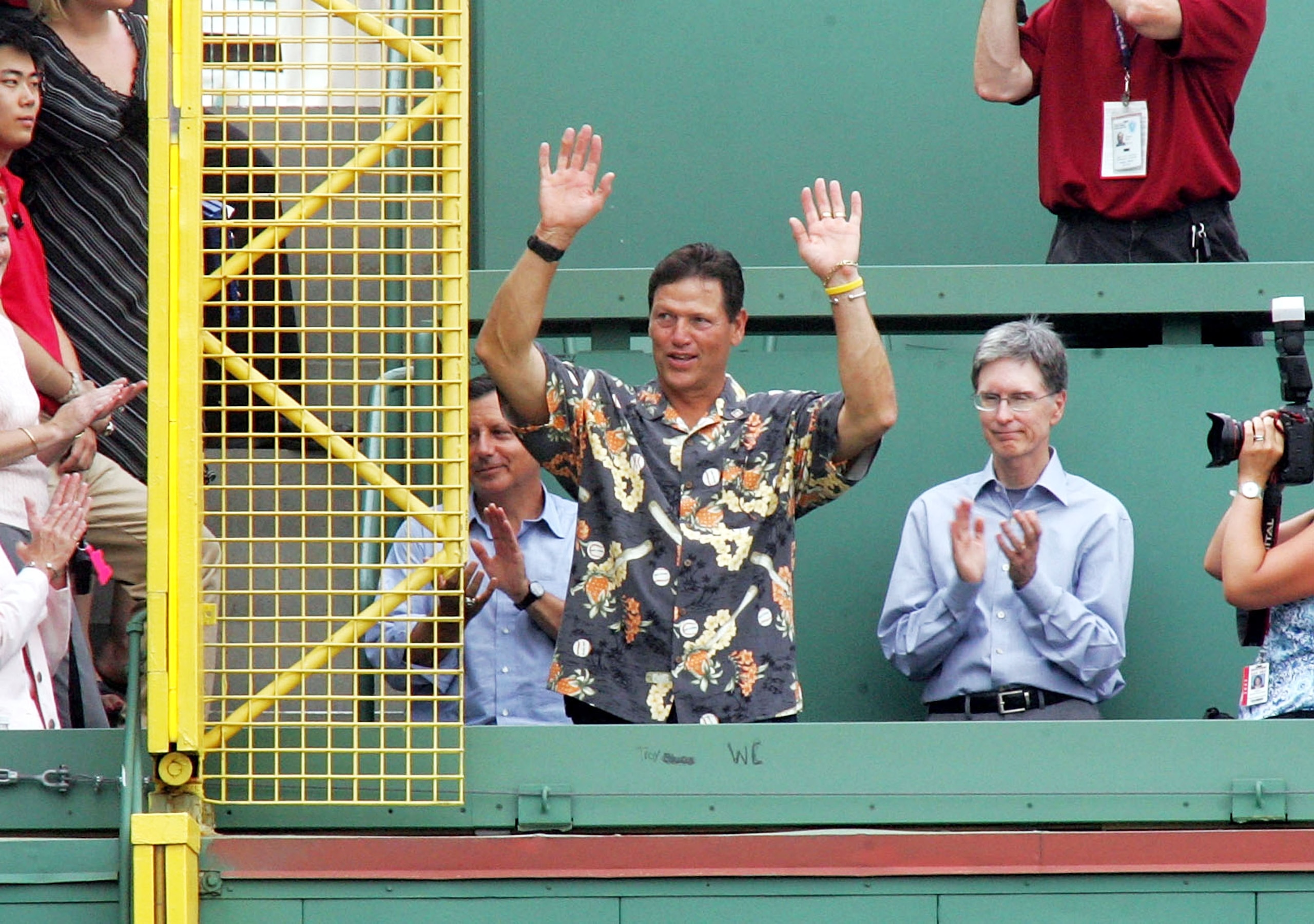 BOSTON, MA - JUNE 13: Former Boston Red Sox legend Carlton Fisk waves to the crowd during a ceremony in which the the Red Sox named the left field foul pole 'The Fisk Pole' before the start of the game between the Cincinnati Reds and Boston at Fenway Park