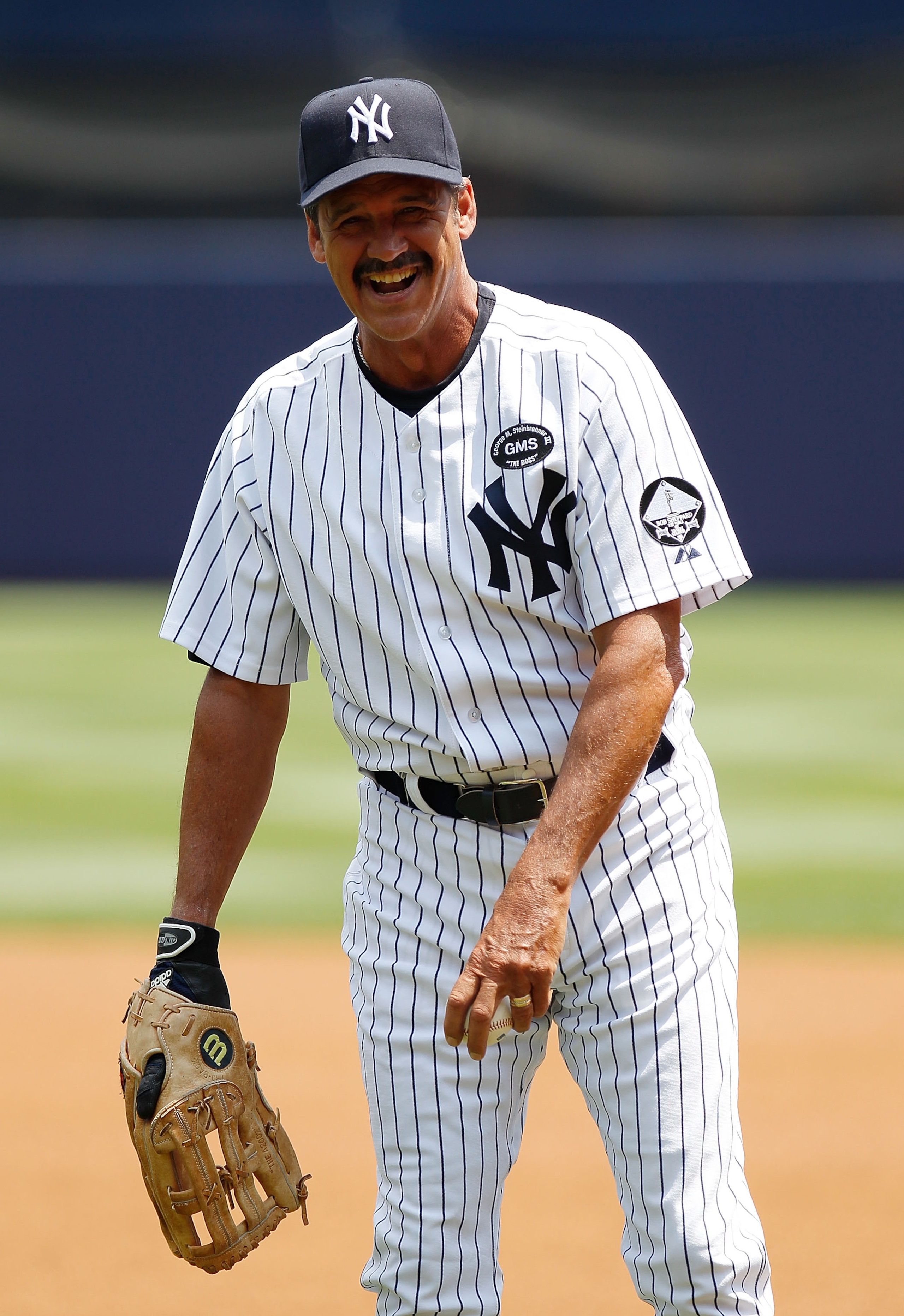 NEW YORK - JULY 17:  Former Yankee pitcher Ron Guidry shares a laugh during the 64th annual Old-Timers' Day prior to the New York Yankees hosting the Tampa Bay Rays on July 17, 2010 at Yankee Stadium in the Bronx borough of New York City.  (Photo by Mike