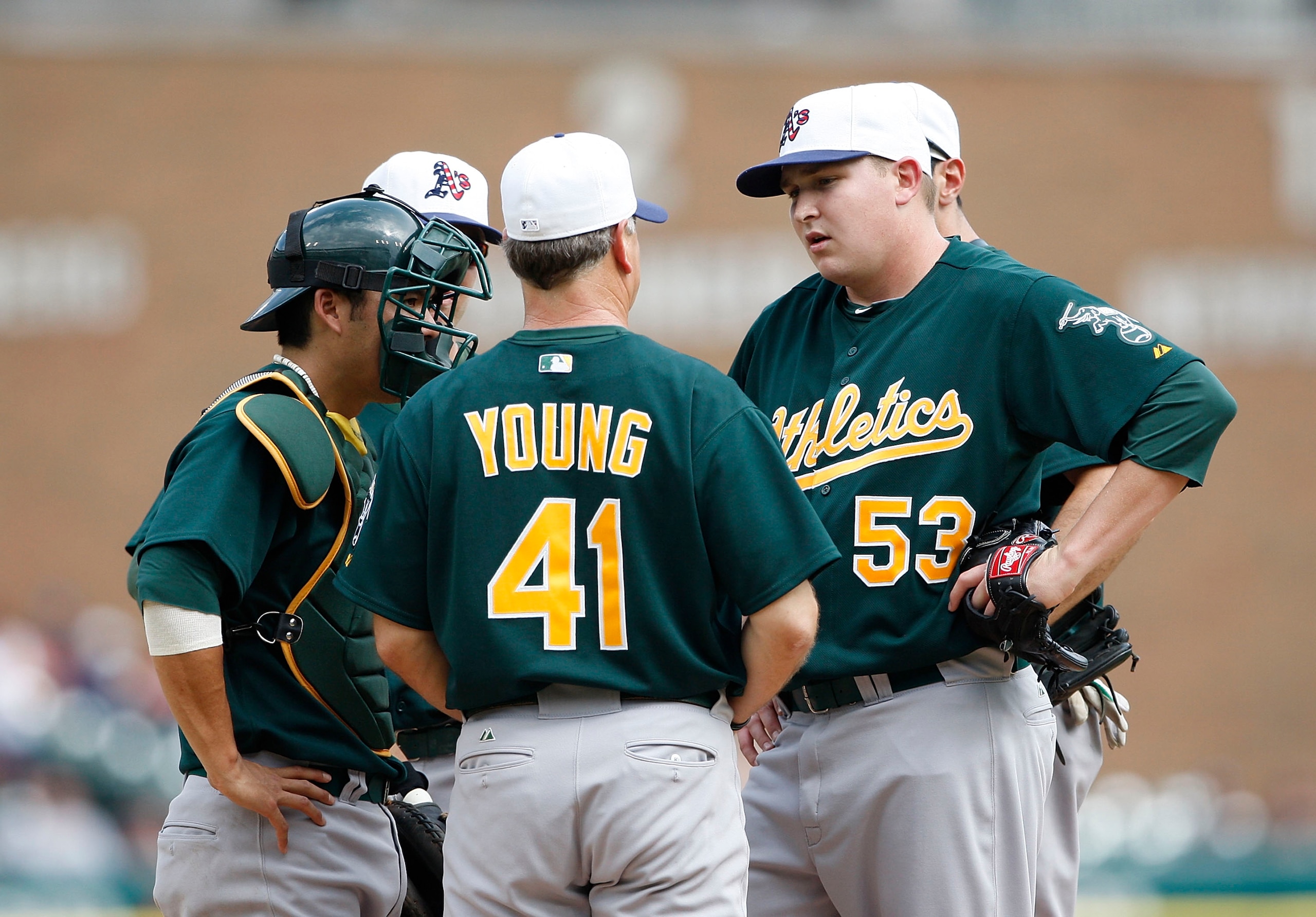 DETROIT- MAY 31: Pitching coach Curt Young #41 talks with Trevor Cahill #53 of the Oakland Athletics in the third inning during action against the Detroit Tigers on May 31, 2010 at Comerica Park in Detroit, Michigan. The Athletics defeated the Tigers 4-1.