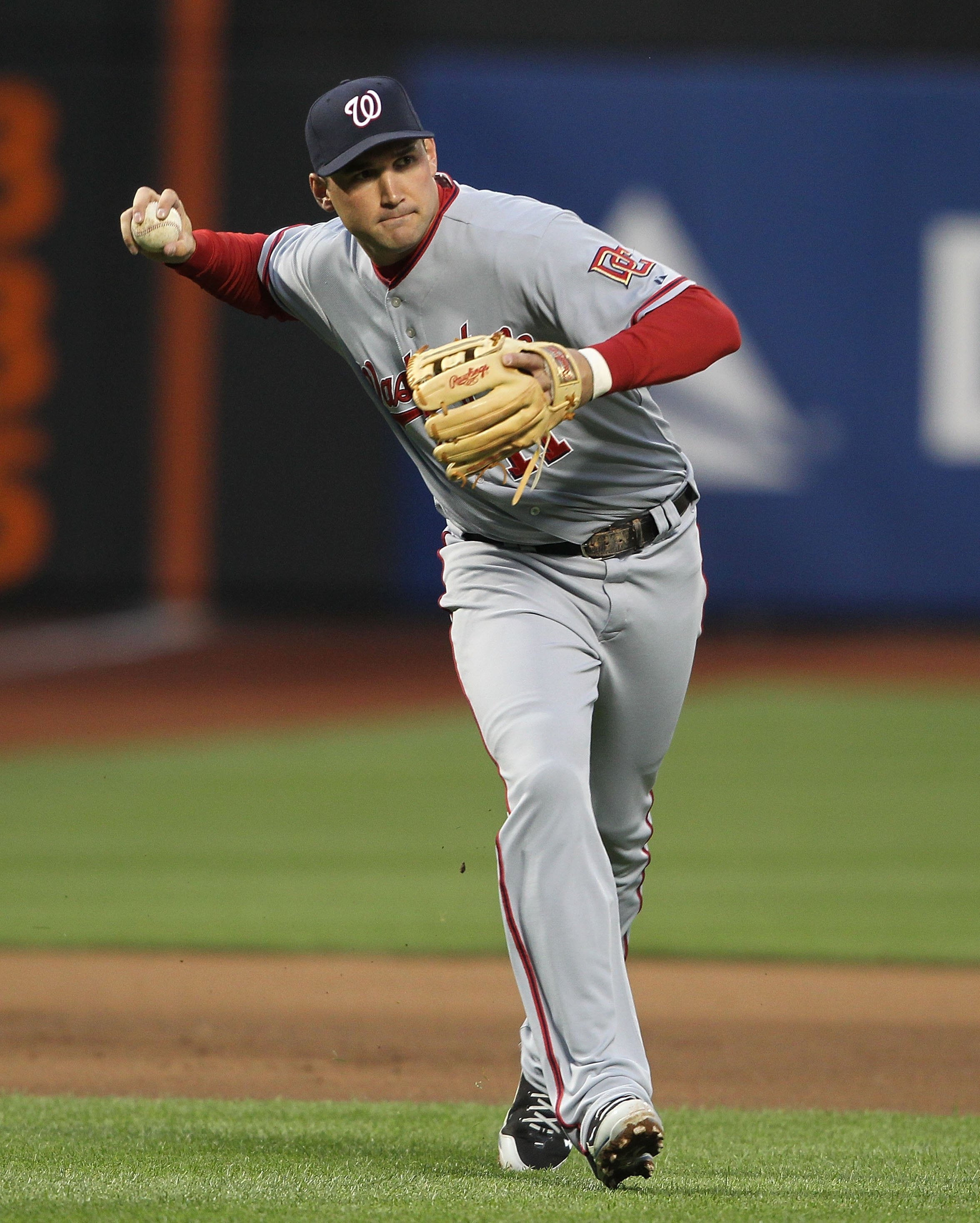 NEW YORK - MAY 11:  Ryan Zimmerman #11 of the Washington Nationals throws to first against the New York Mets at Citi Field on May 11, 2010 in the Flushing neighborhood of the Queens borough of New York City.  (Photo by Nick Laham/Getty Images)
